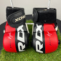 Front view of RDX T6 MMA grappling gloves in red and black with bold RDX logo and Velcro wrist straps