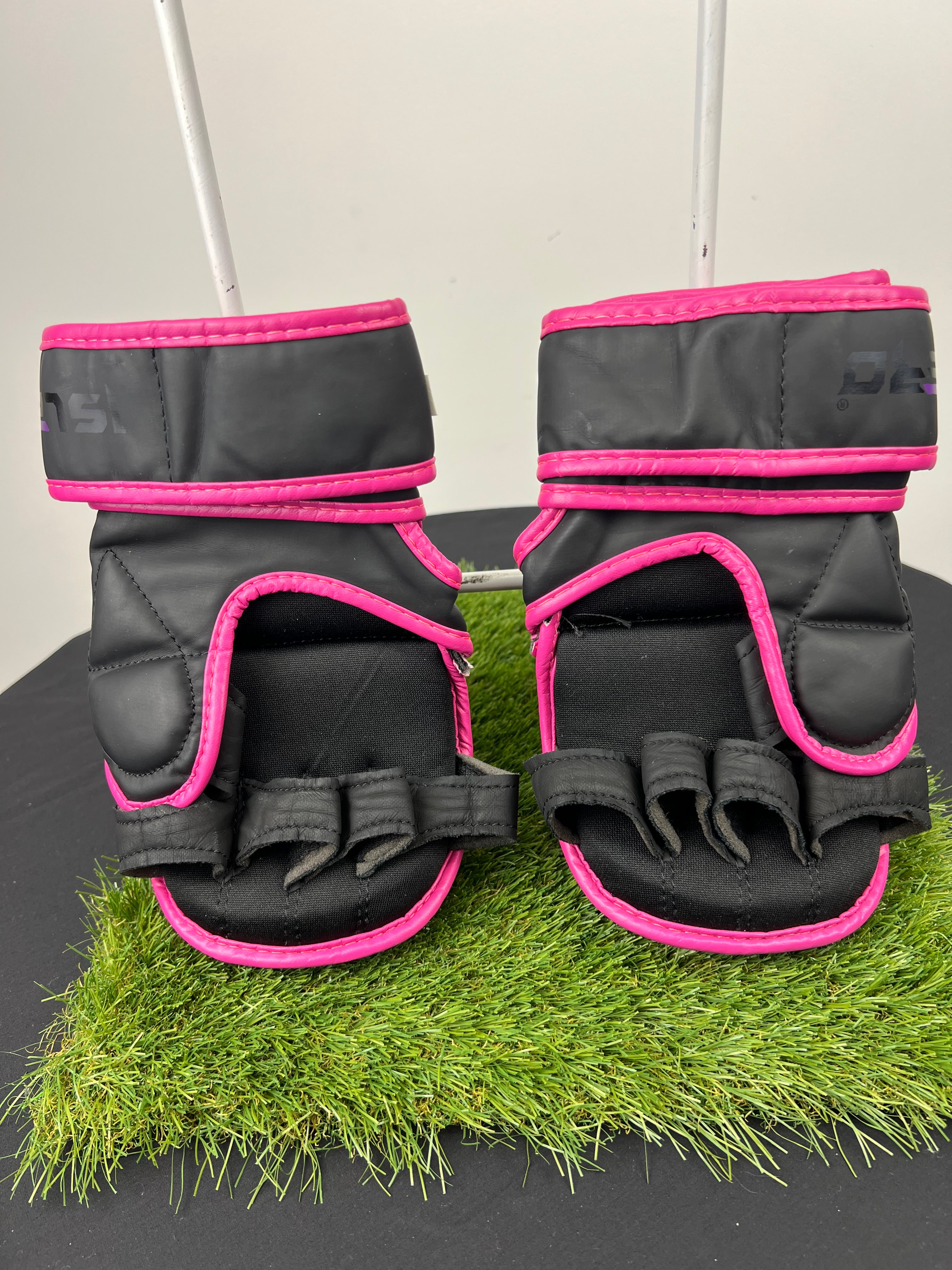 Back view of Islero MMA grappling gloves showing finger openings and wrist straps