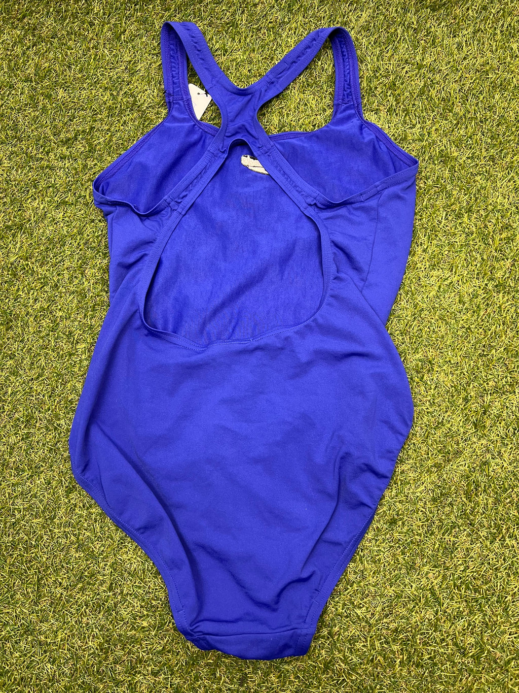 Back view of purple Speedo swimsuit showing cutout and double straps