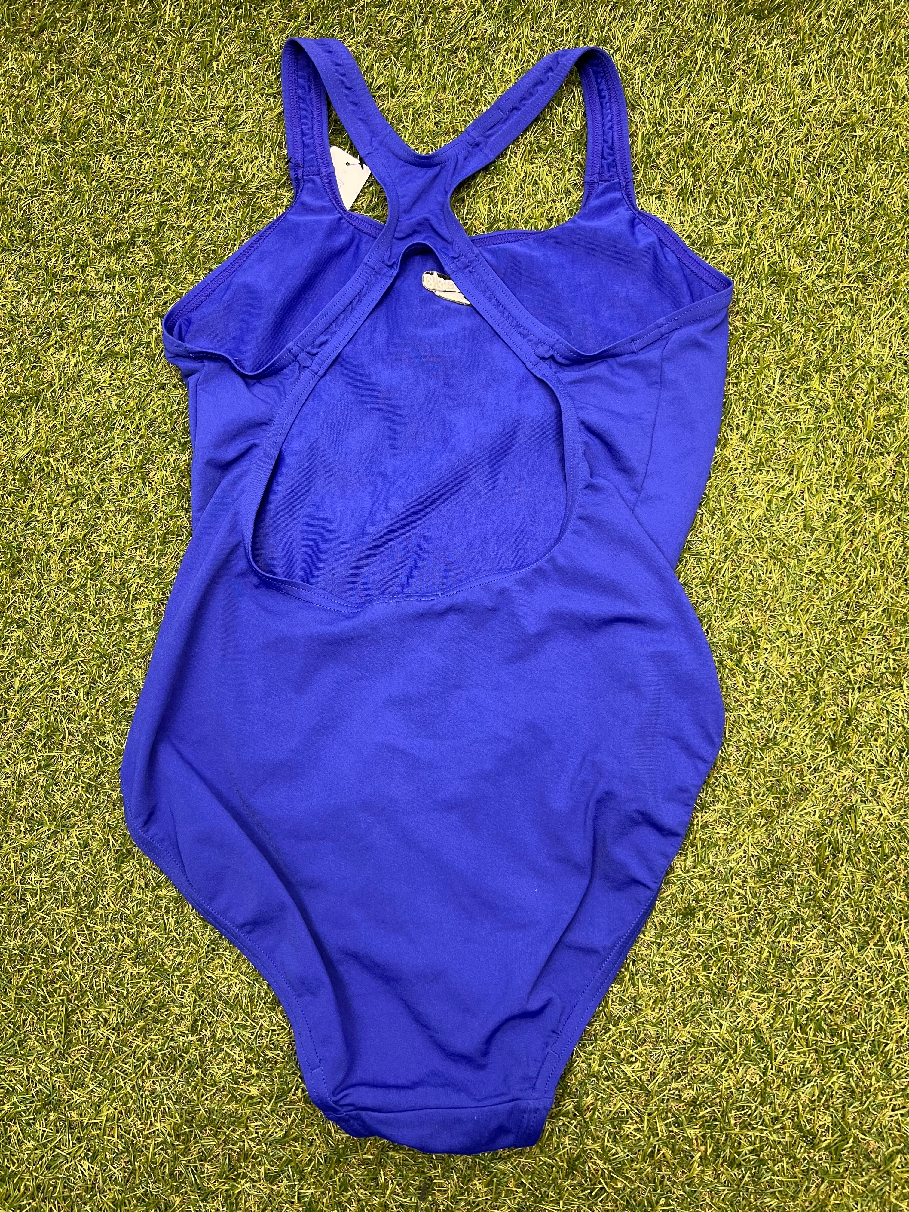 Back view of purple Speedo swimsuit showing cutout and double straps