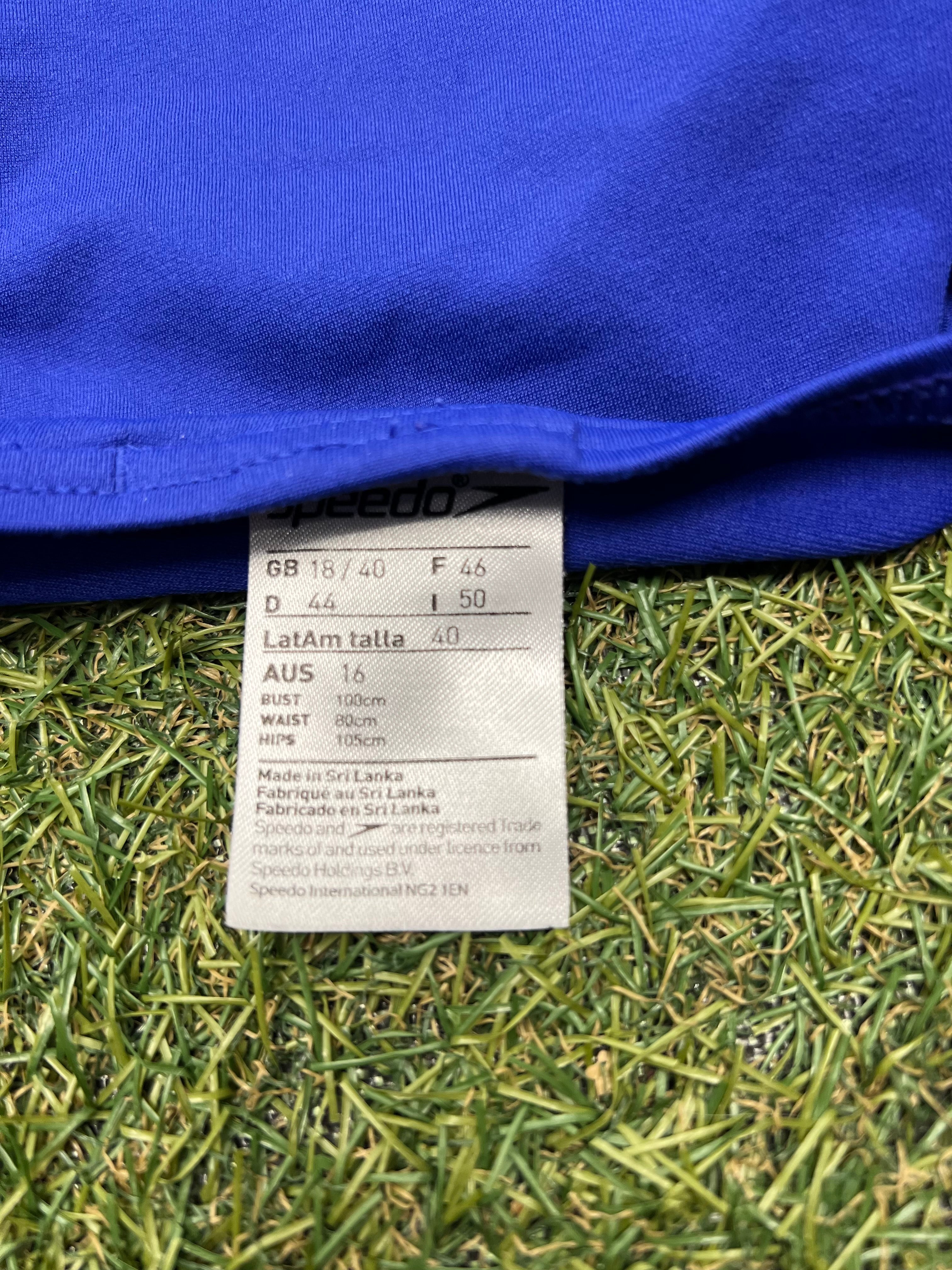 Close-up of Speedo swimsuit fabric label with size and care instructions