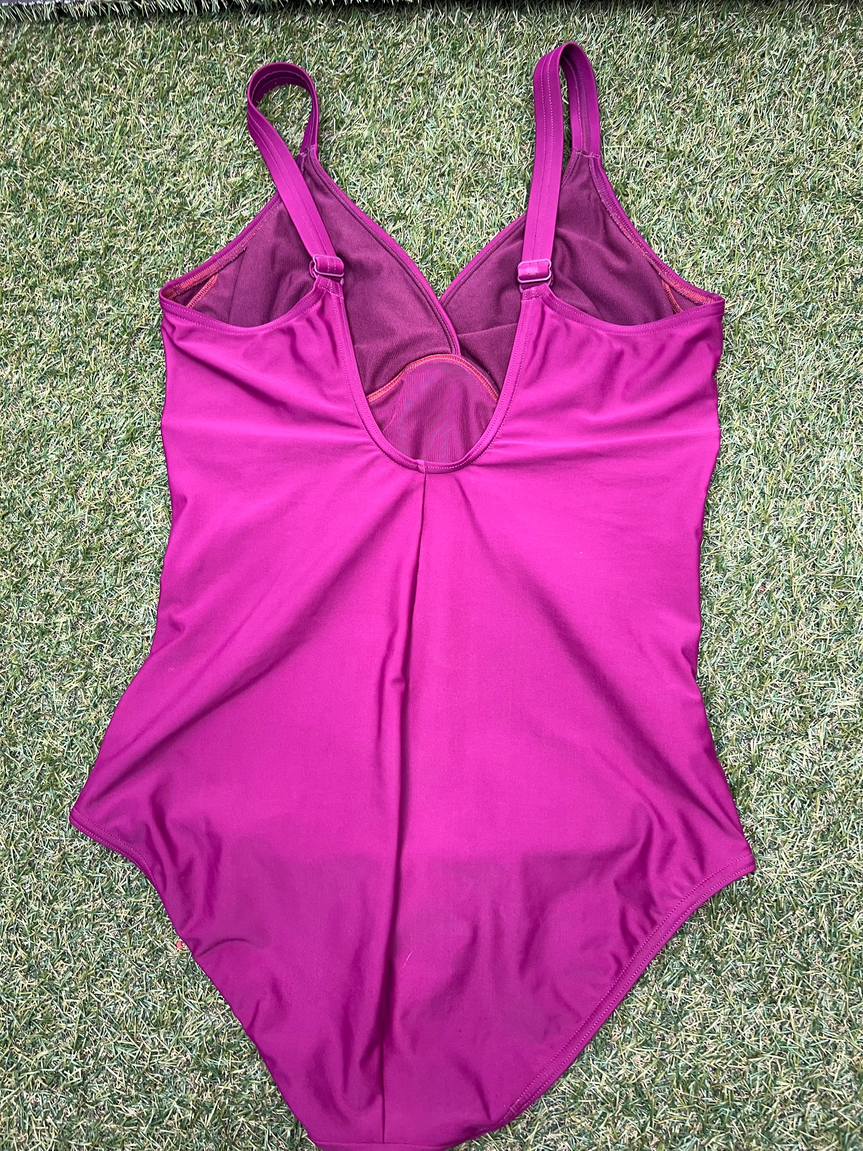 Back view of a women's purple Speedo swimsuit size 16 showing open back and strap details