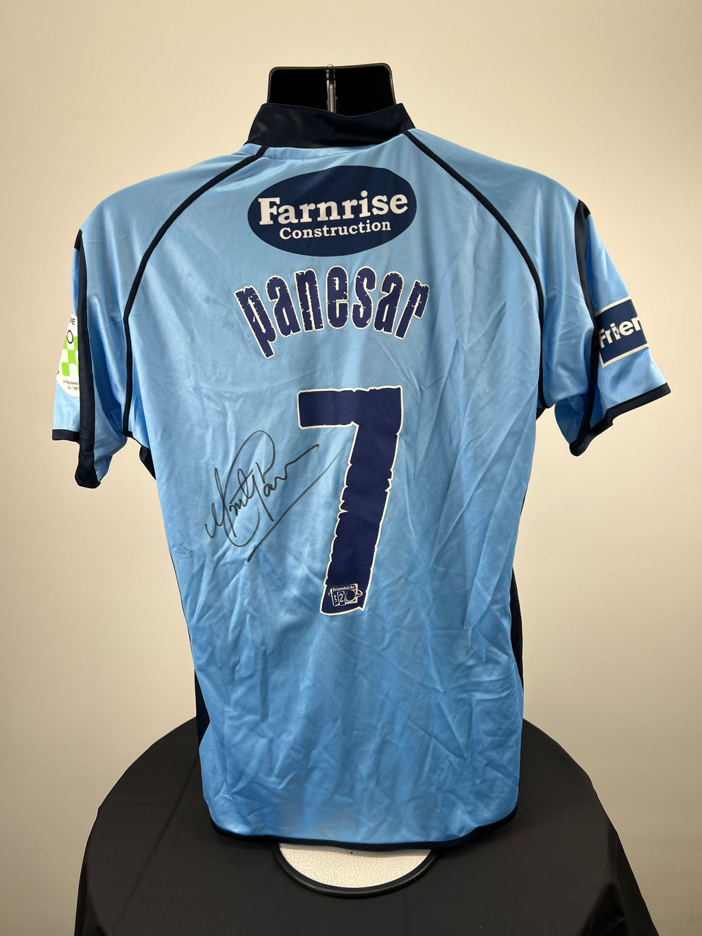 Back view of Sussex Sharks cricket shirt showing Panesar name, number 7, and Farnrise Construction sponsor logo