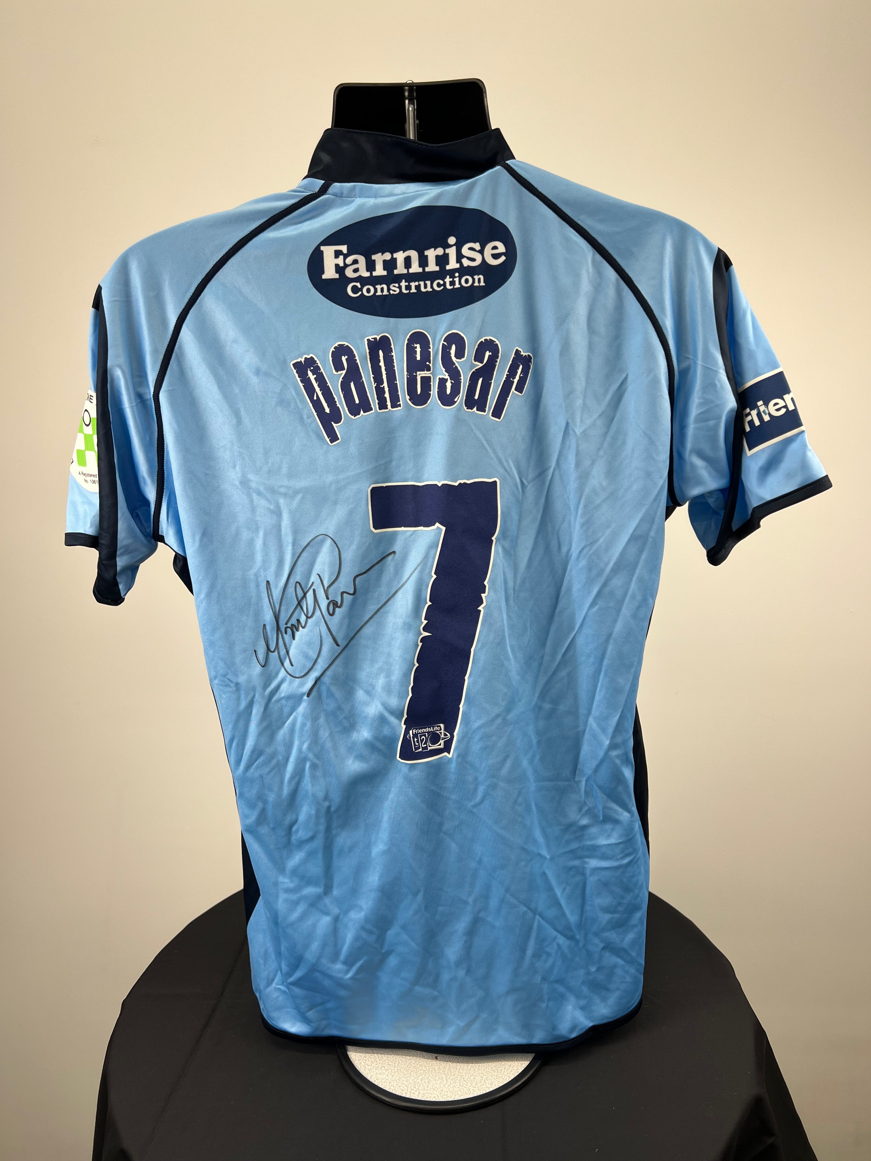 Back view of Sussex Sharks cricket shirt showing Panesar name, number 7, and Farnrise Construction sponsor logo