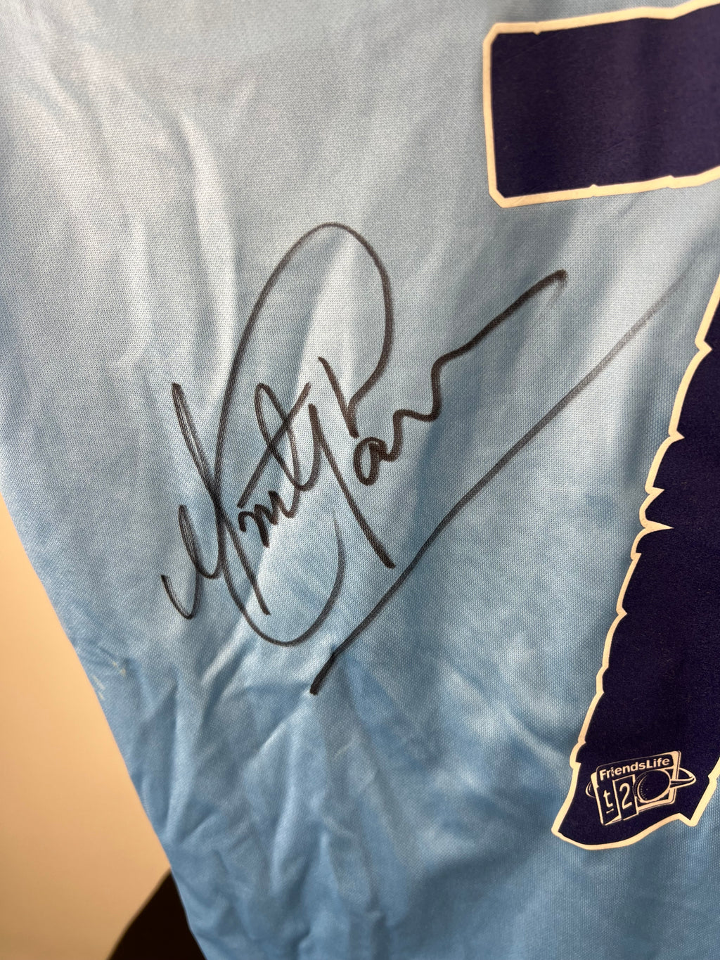 Close-up of Monty Panesar's signature on the back of the Sussex Sharks cricket shirt