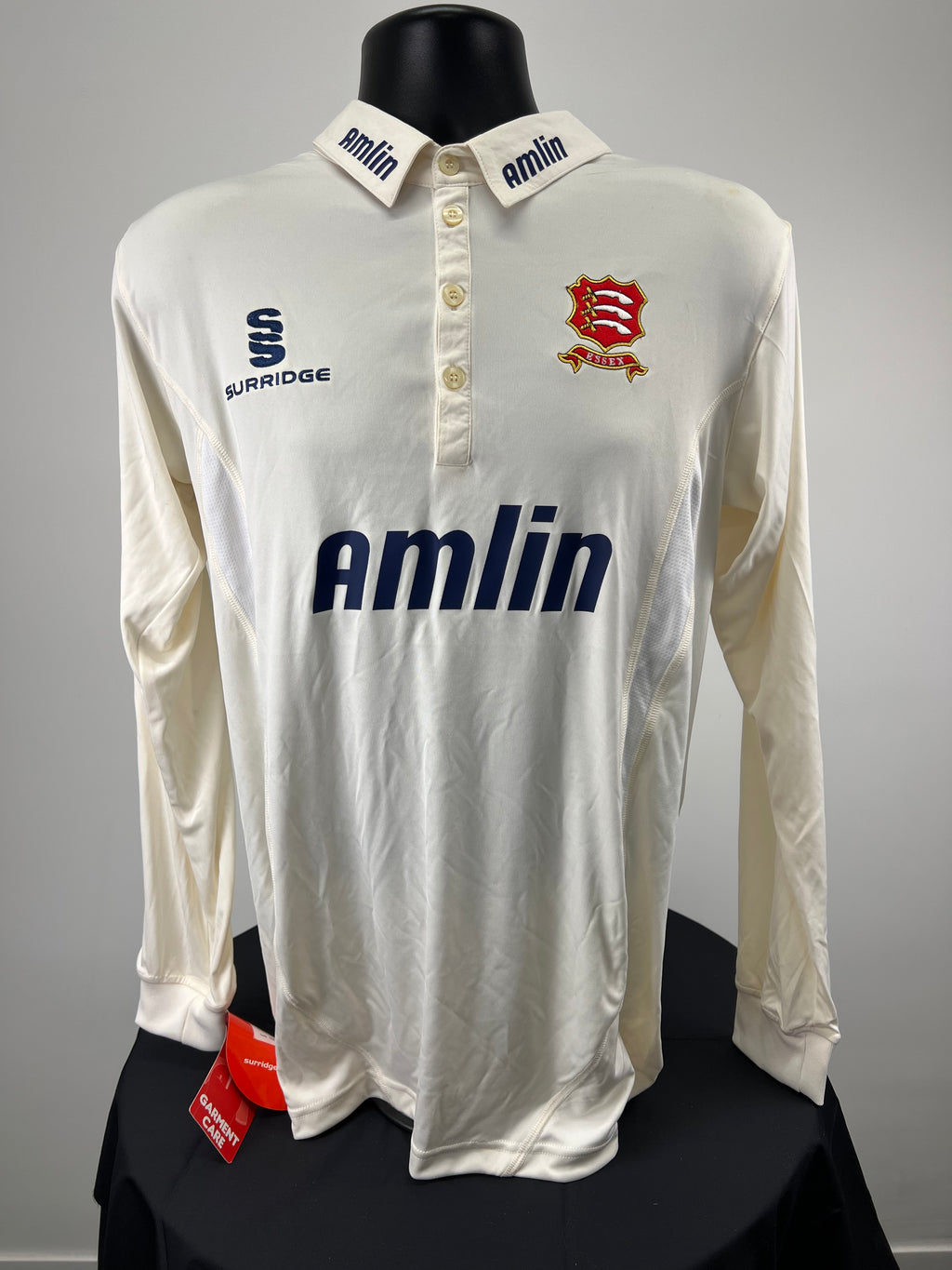 Front view of Essex County long sleeve cricket shirt with Amlin logo and Essex badge
