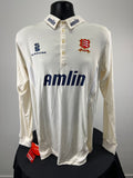 Front view of Essex County long sleeve cricket shirt with Amlin logo and Essex badge