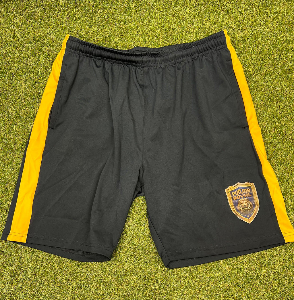 Front view of Men’s Punjab Royal black sports shorts with golden yellow side stripes and team lion logo