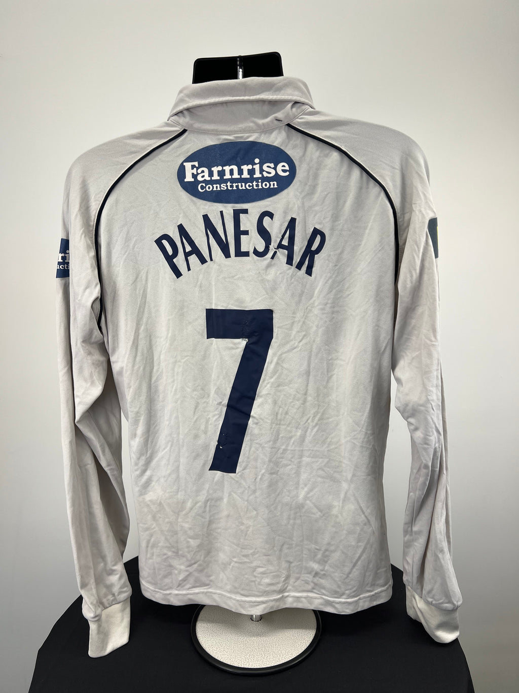 Back view of white Sussex CCC cricket jersey showing name Panesar and number 7