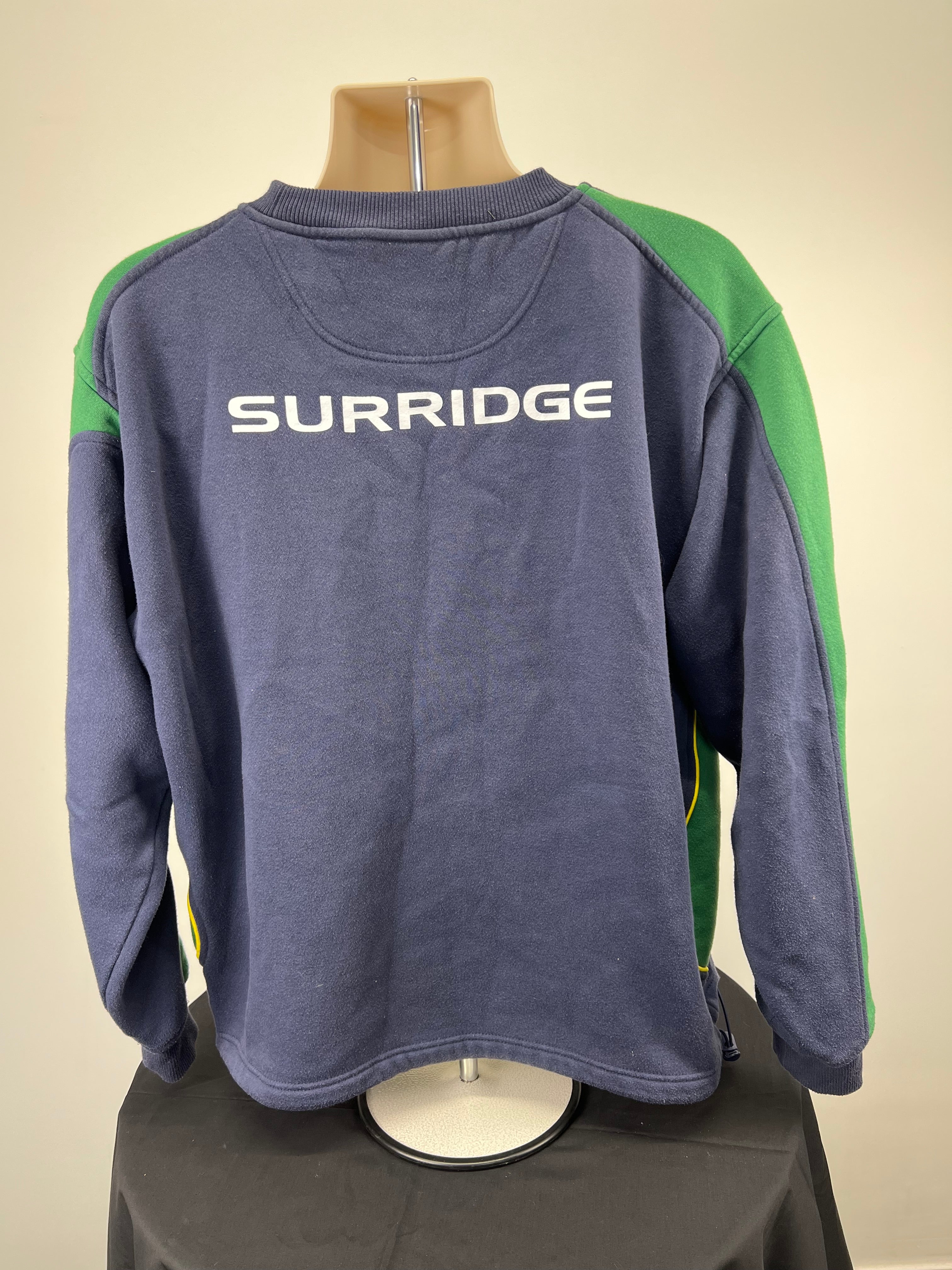 Back of Northants cricket sweatshirt with SURRIDGE logo and green sleeve panels