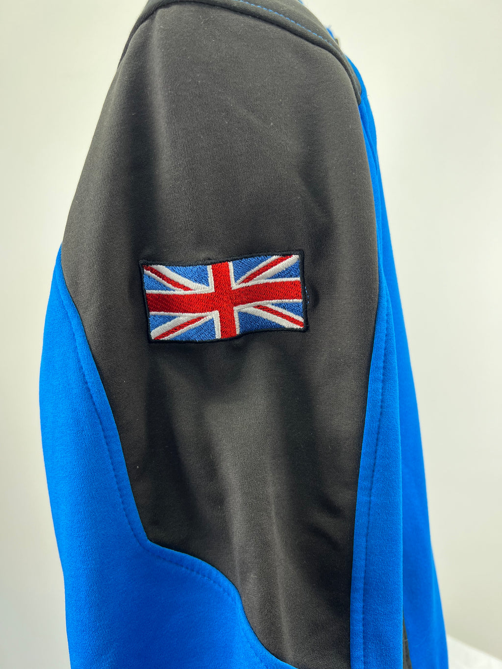 Close-up of Union Jack flag patch on the jacket's sleeve