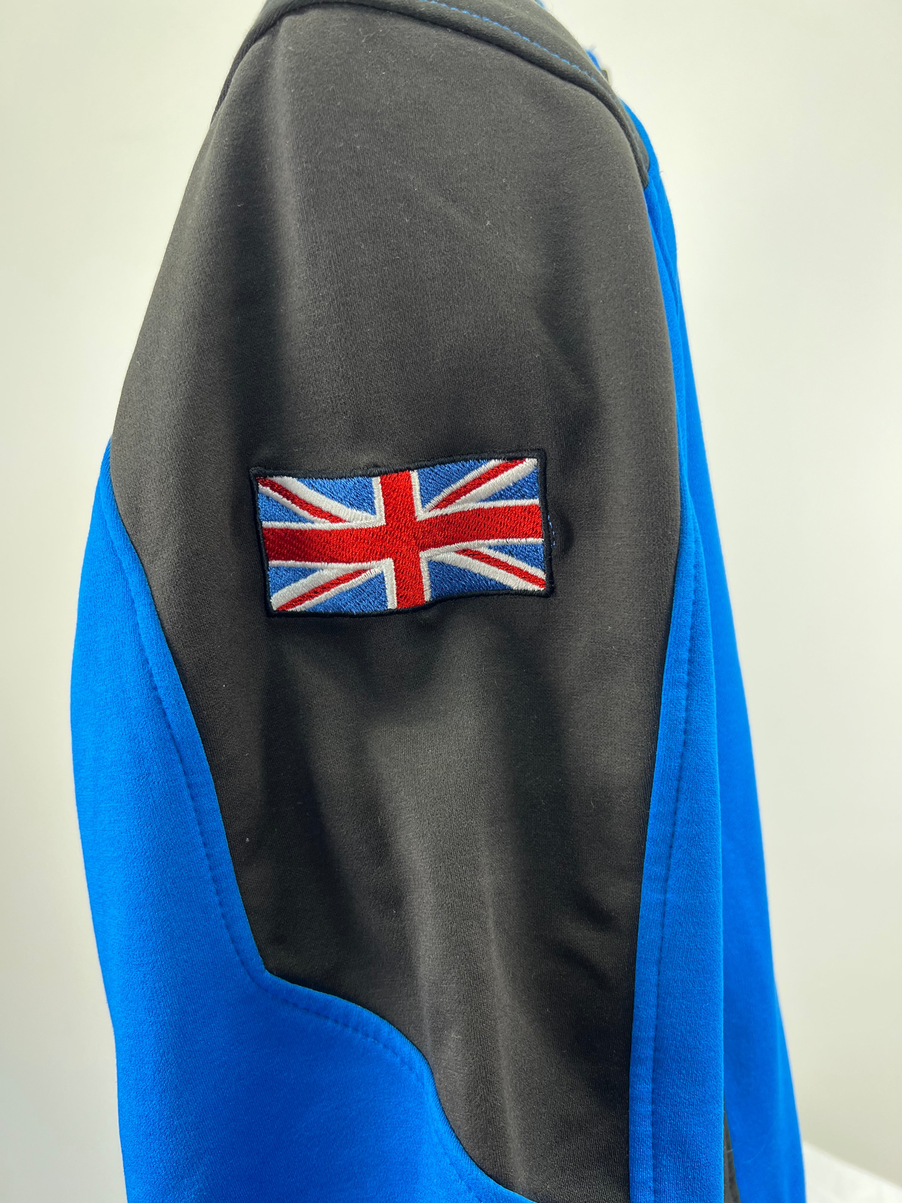 Close-up of Union Jack flag patch on the jacket's sleeve