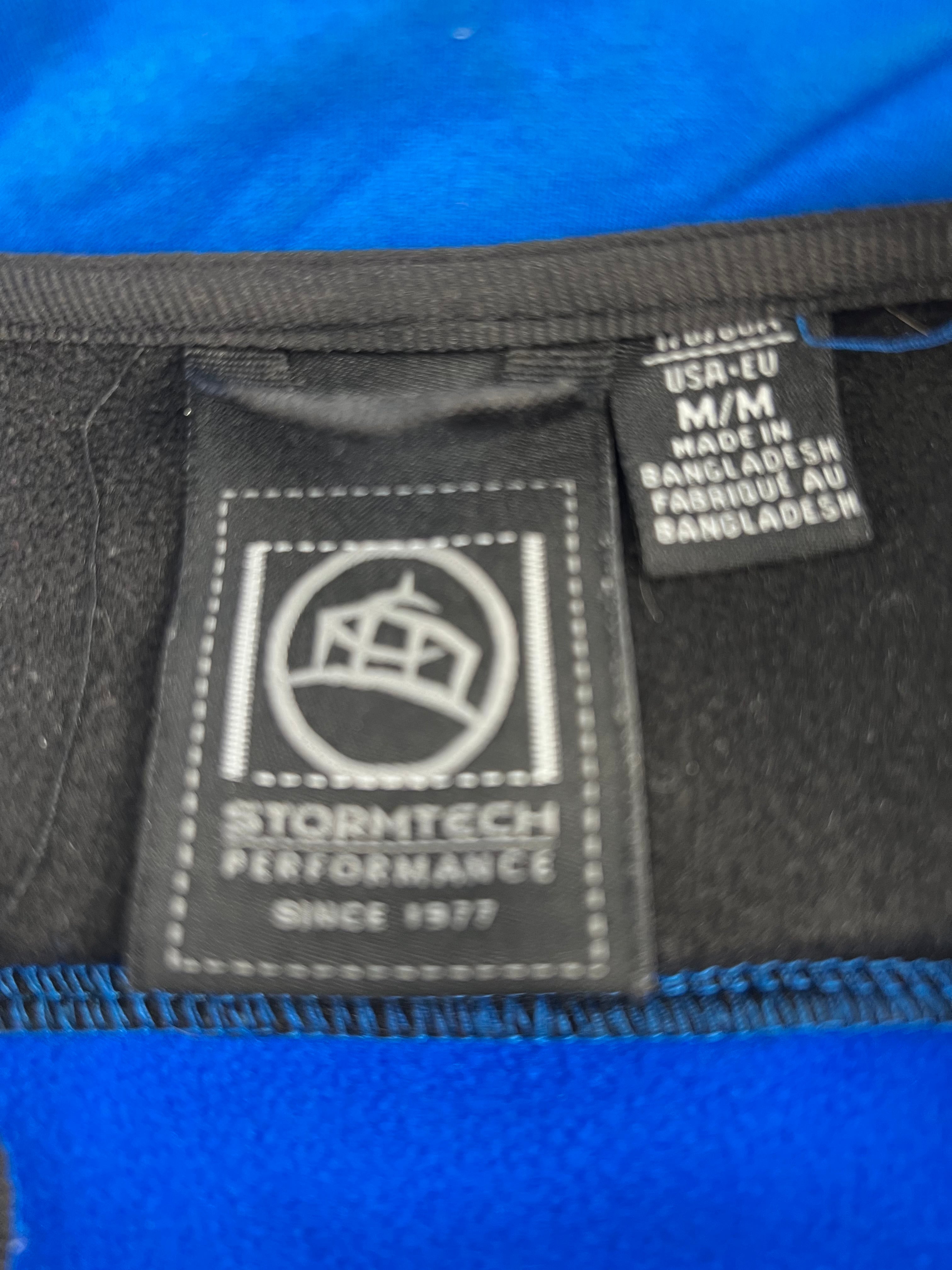 Stormtech Performance label and size tag inside the jacket collar