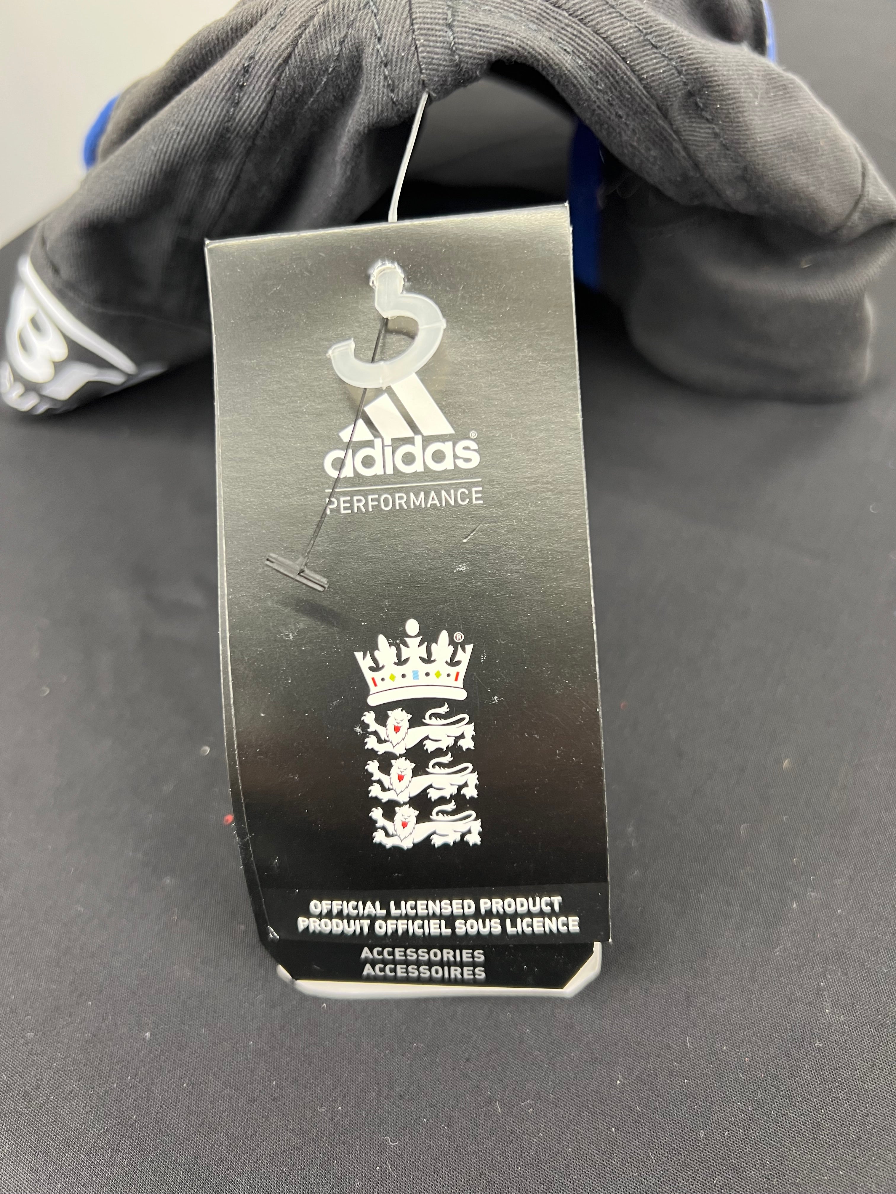 Close-up of adidas performance tag on Official Licensed England cricket cap