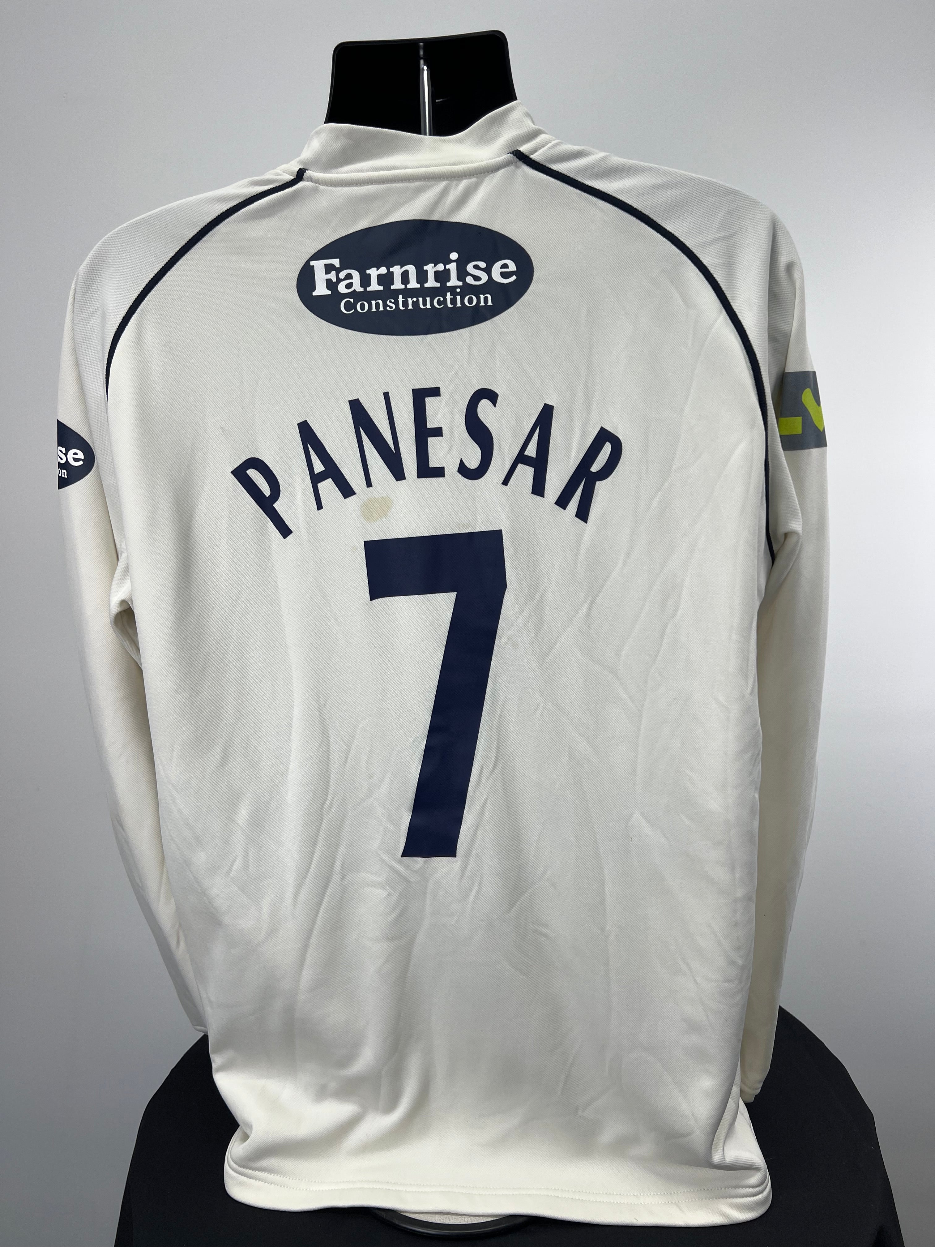 Back view of Monty Panesar cricket jumper showing Panesar 7 name and sponsor logos