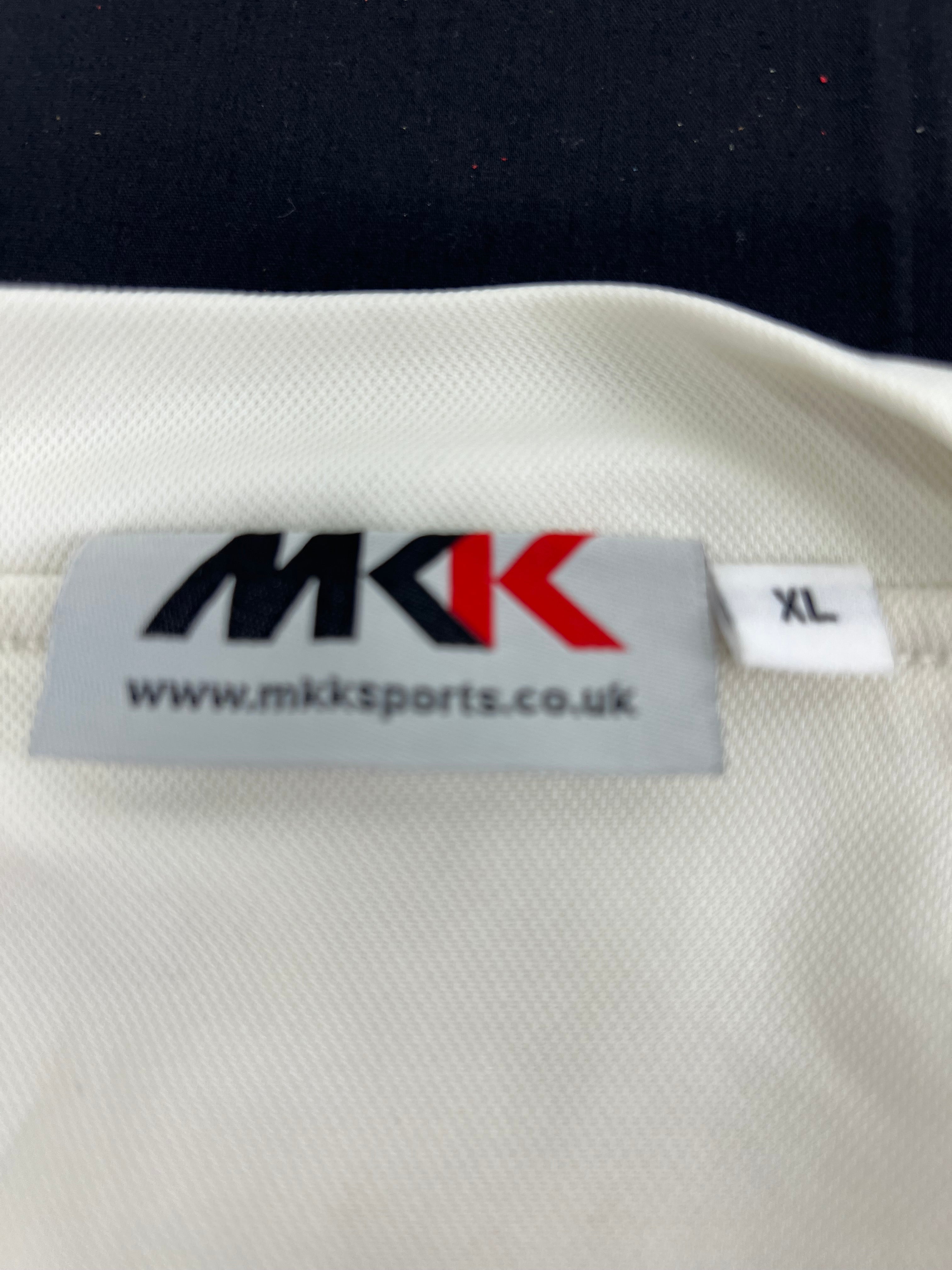 Close-up of MKK sports label inside Monty Panesar cricket jumper size XL