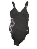Speedo Sculpture black swimsuit laid flat on green grass showing front view with decorative print on side