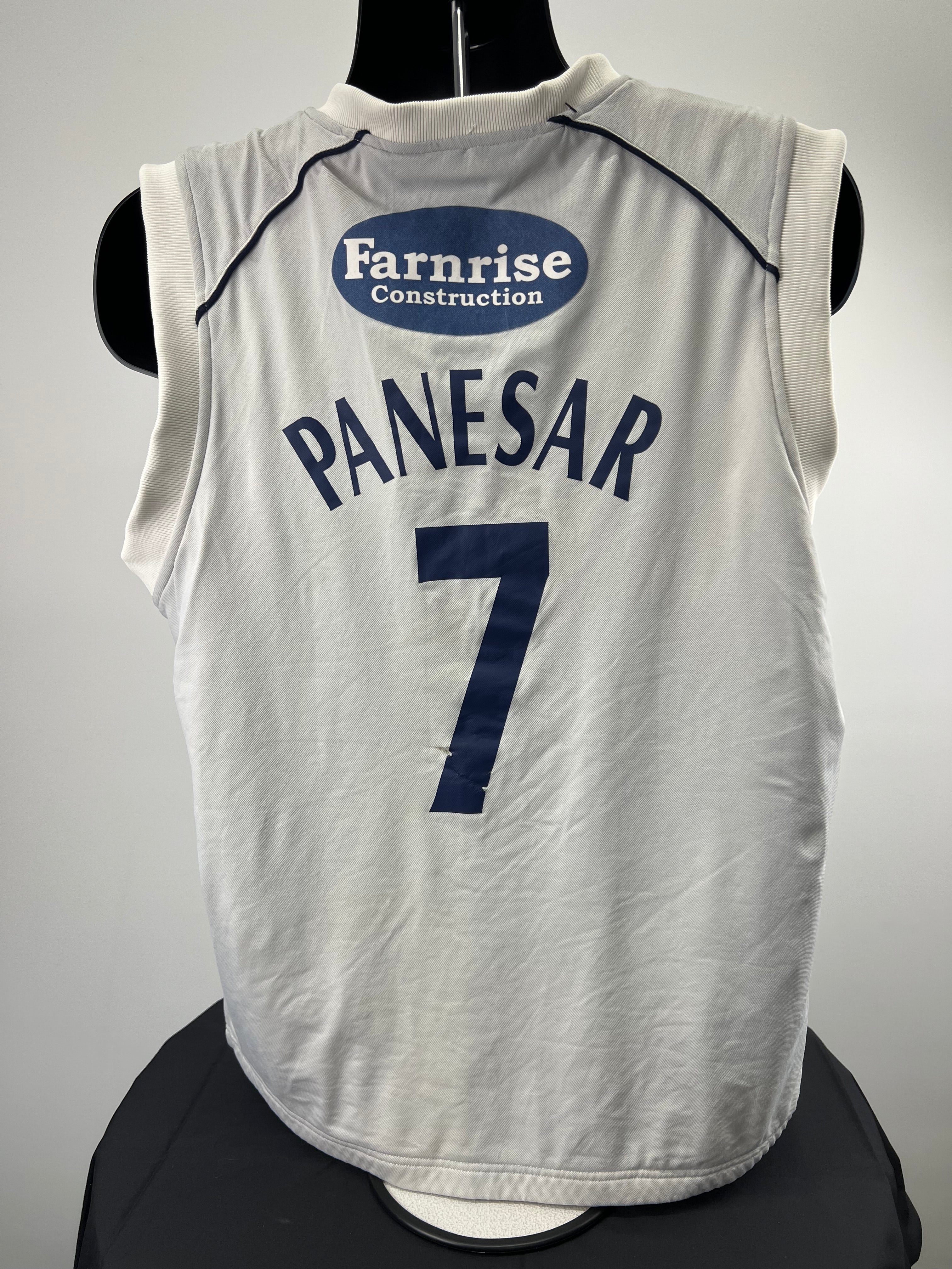 Back view of sleeveless cricket jumper featuring name 'Panesar' and number 7 with Farnrise Construction sponsor logo