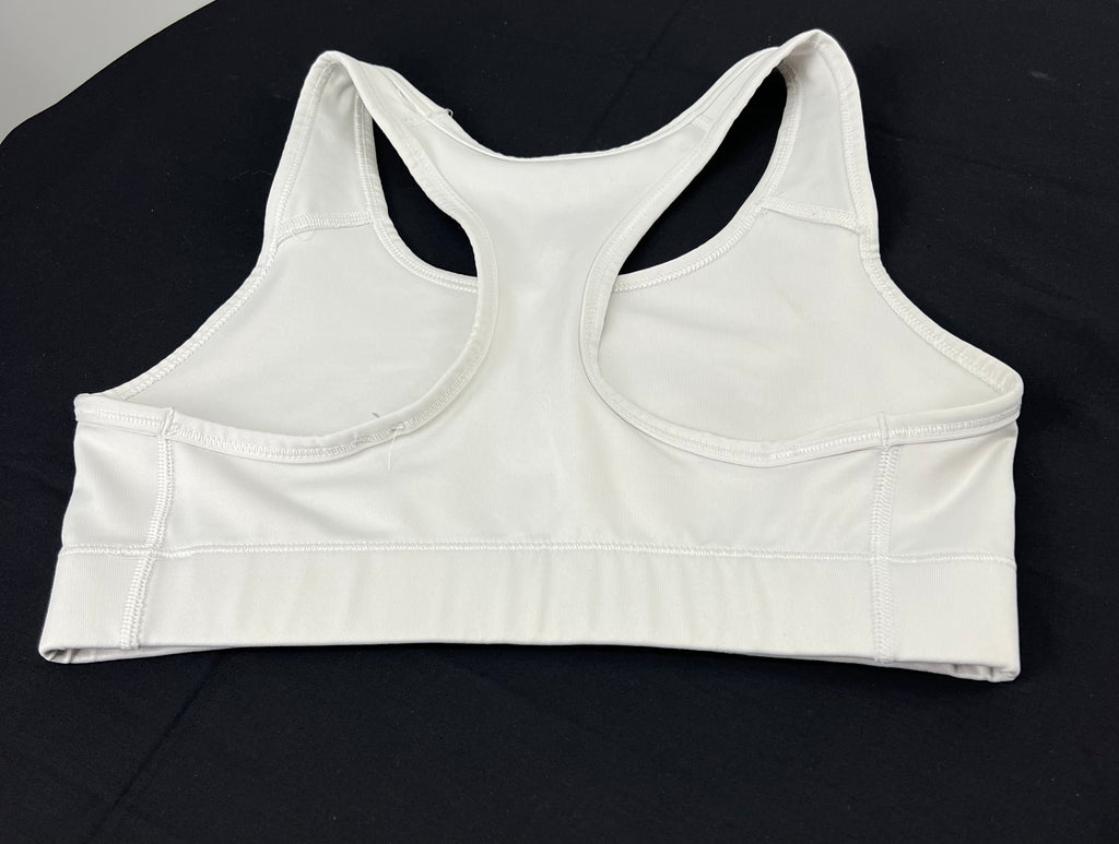 Back view of Nike white Dri-FIT sports bra showing racerback design