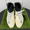 Pair of Nike Phantom Luna football boots top view on artificial grass