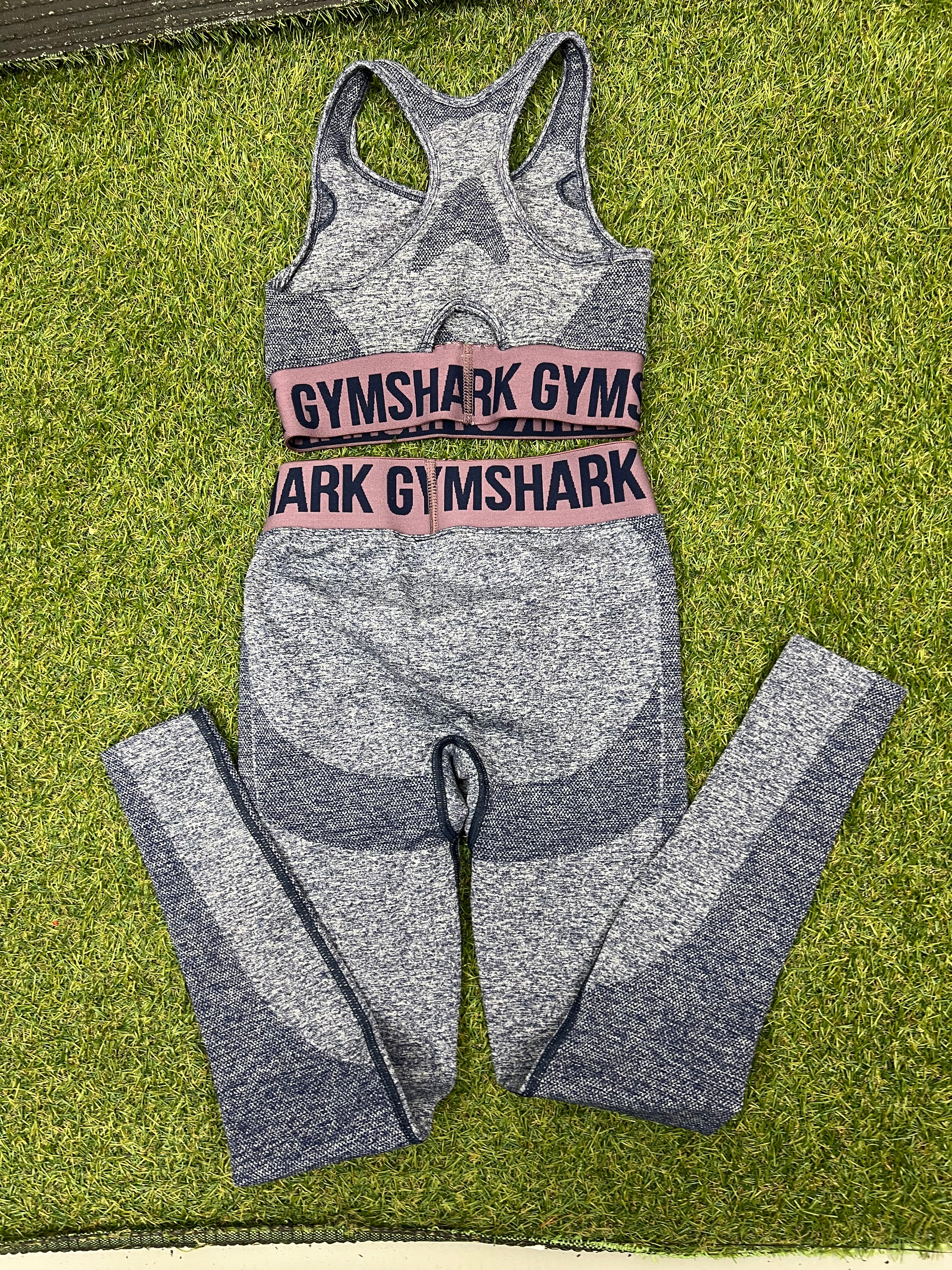 Back view of Gymshark blue marl bra top and leggings set showing racerback design and logo bands