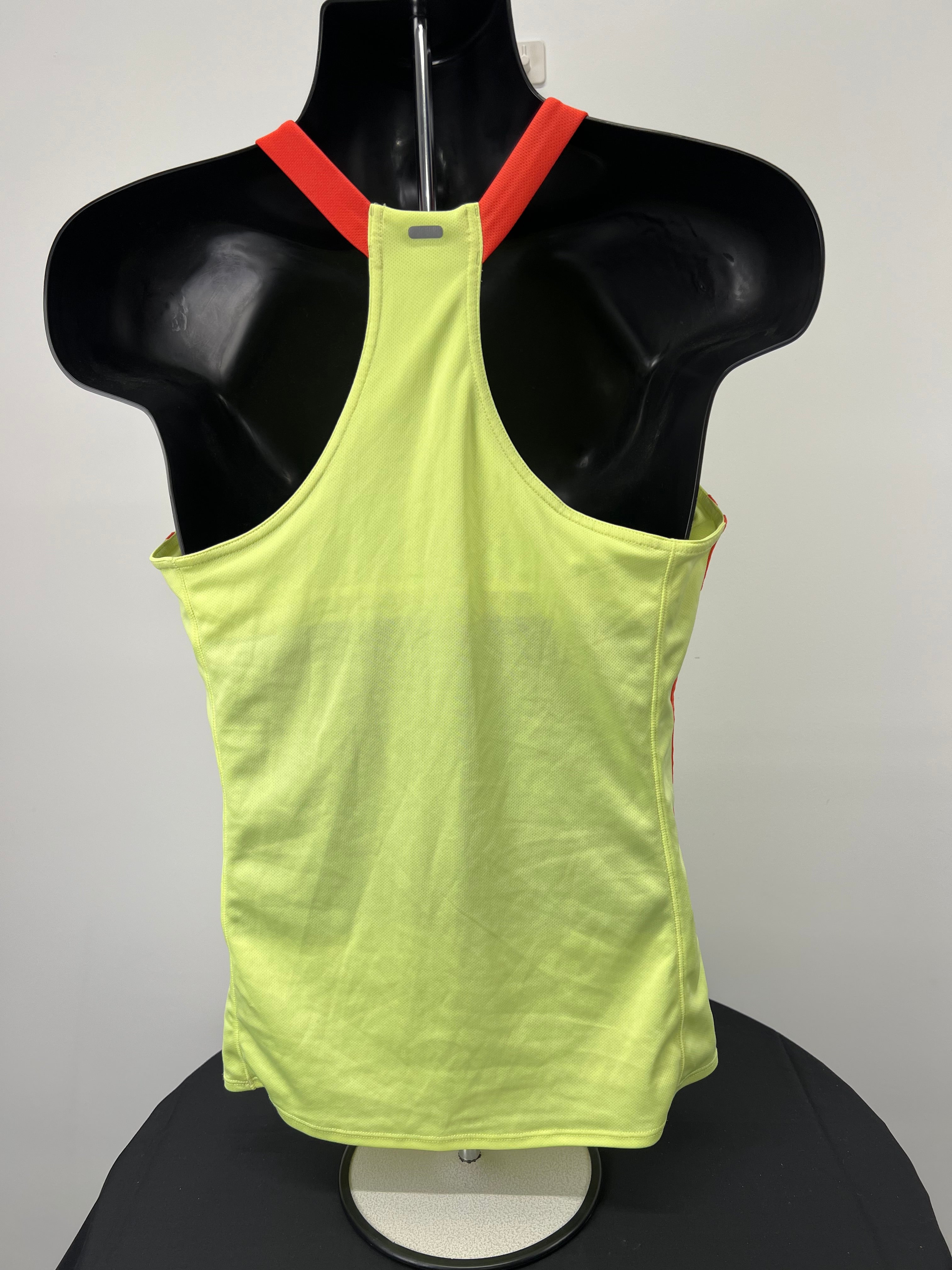 Rear view of Adidas yellow Climalite sports vest showing racerback design and reflective strip