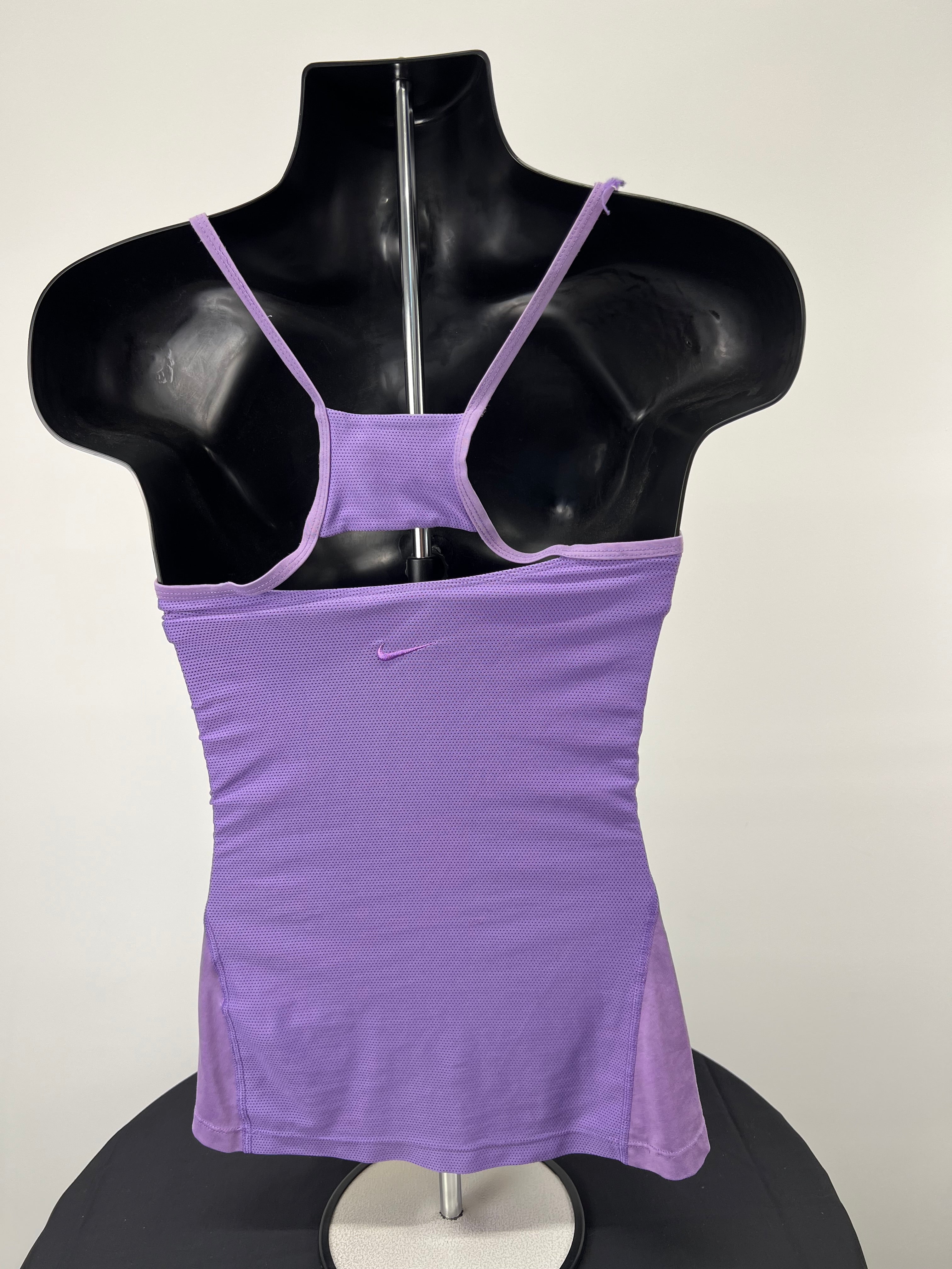 Back view of Nike mauve sports vest showing breathable mesh panel and fine stitching