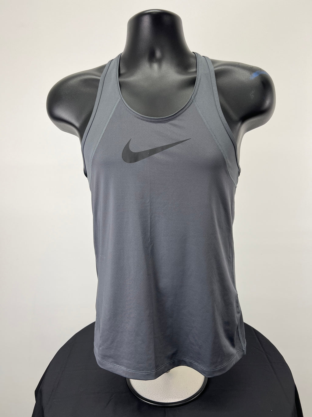 Front view of Nike Dri-Fit grey racerback sports vest on mannequin