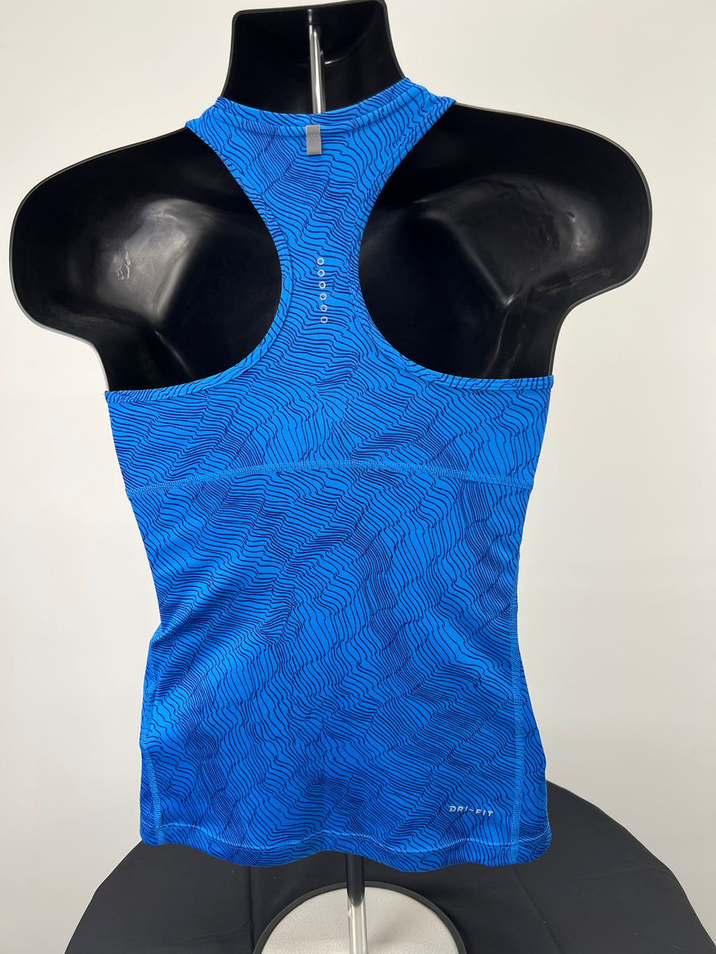 Rear view of Nike blue running vest showing racerback design and Dri-Fit print