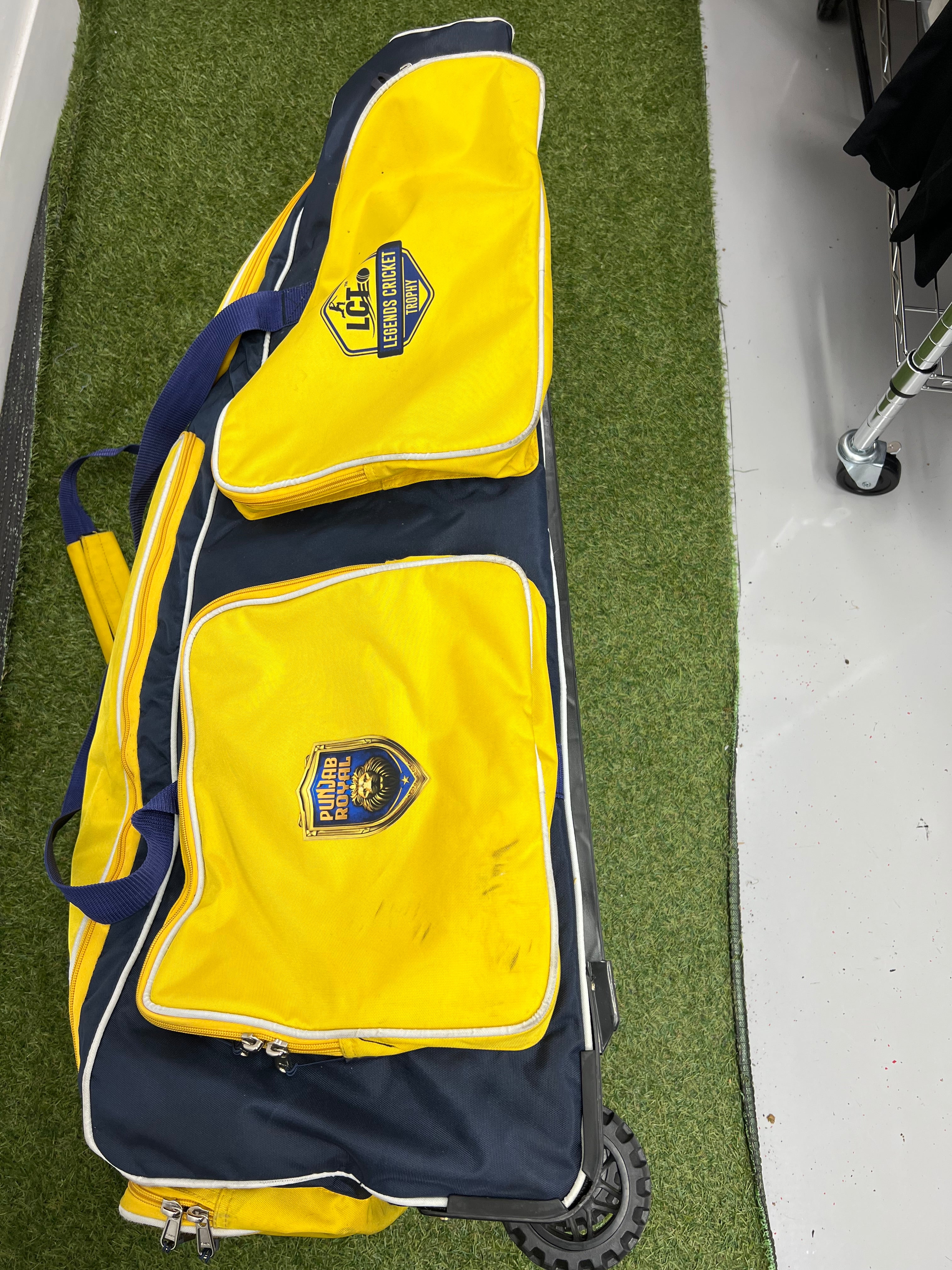 Top-down view of the Punjab Royal bag placed horizontally showing large zippered compartments