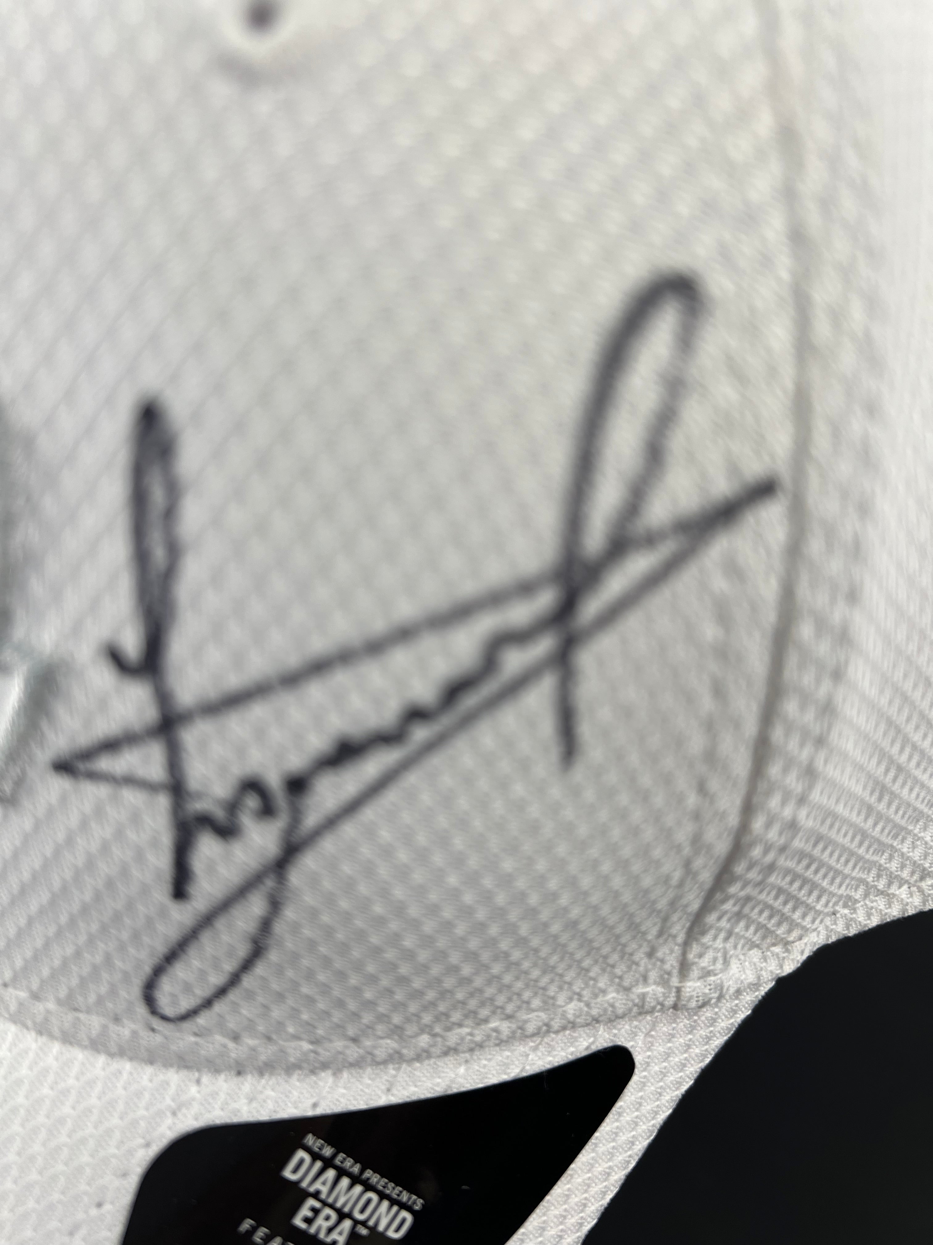 Close-up of New Era 9FORTY cap branding on sticker on the cap's brim