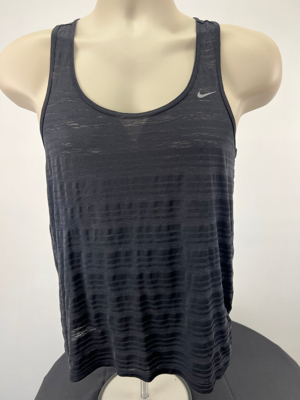 Front view of Nike black Dri-FIT sports vest on mannequin