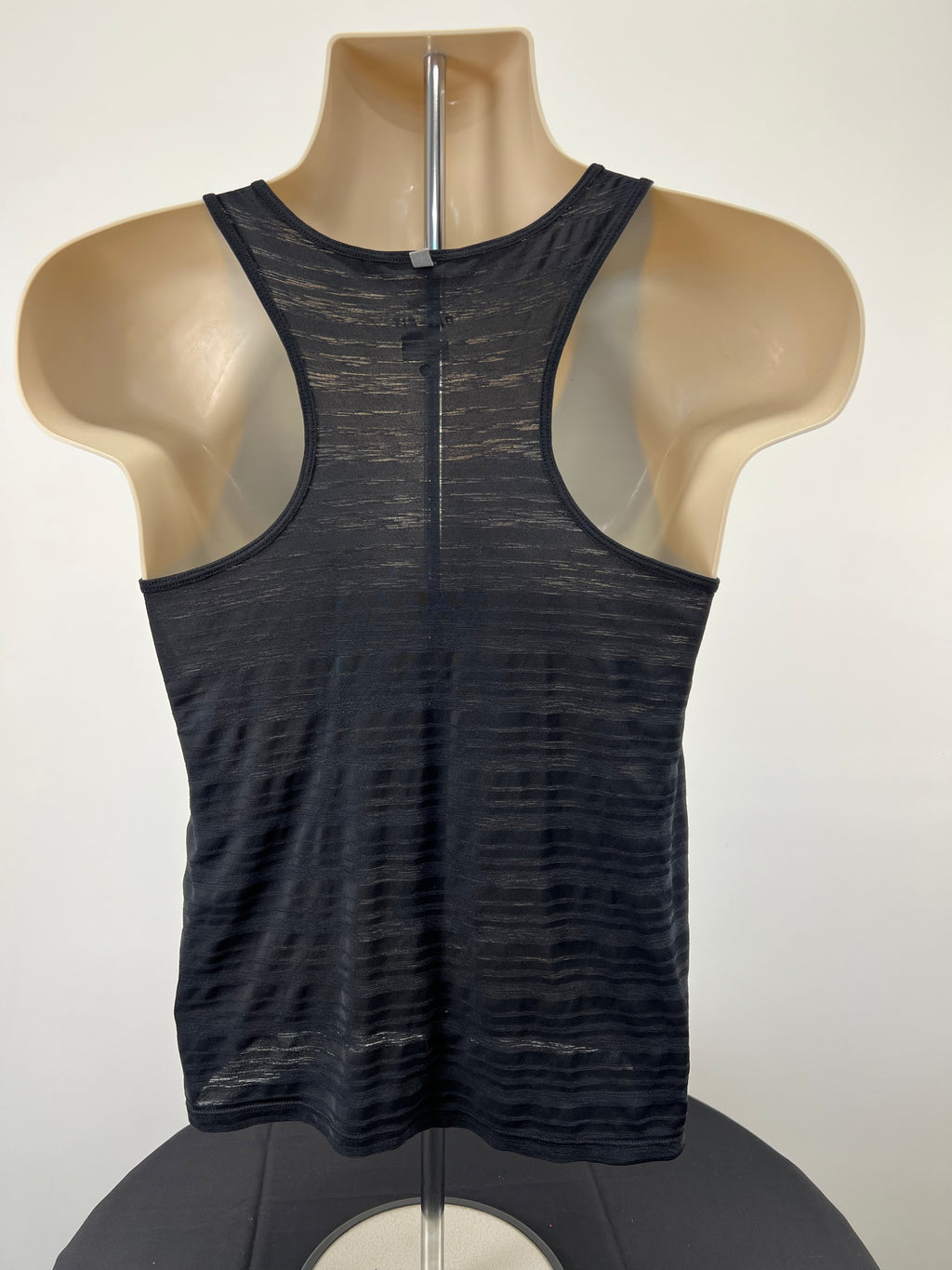 Back view of Nike black Dri-FIT sports vest showing racerback design