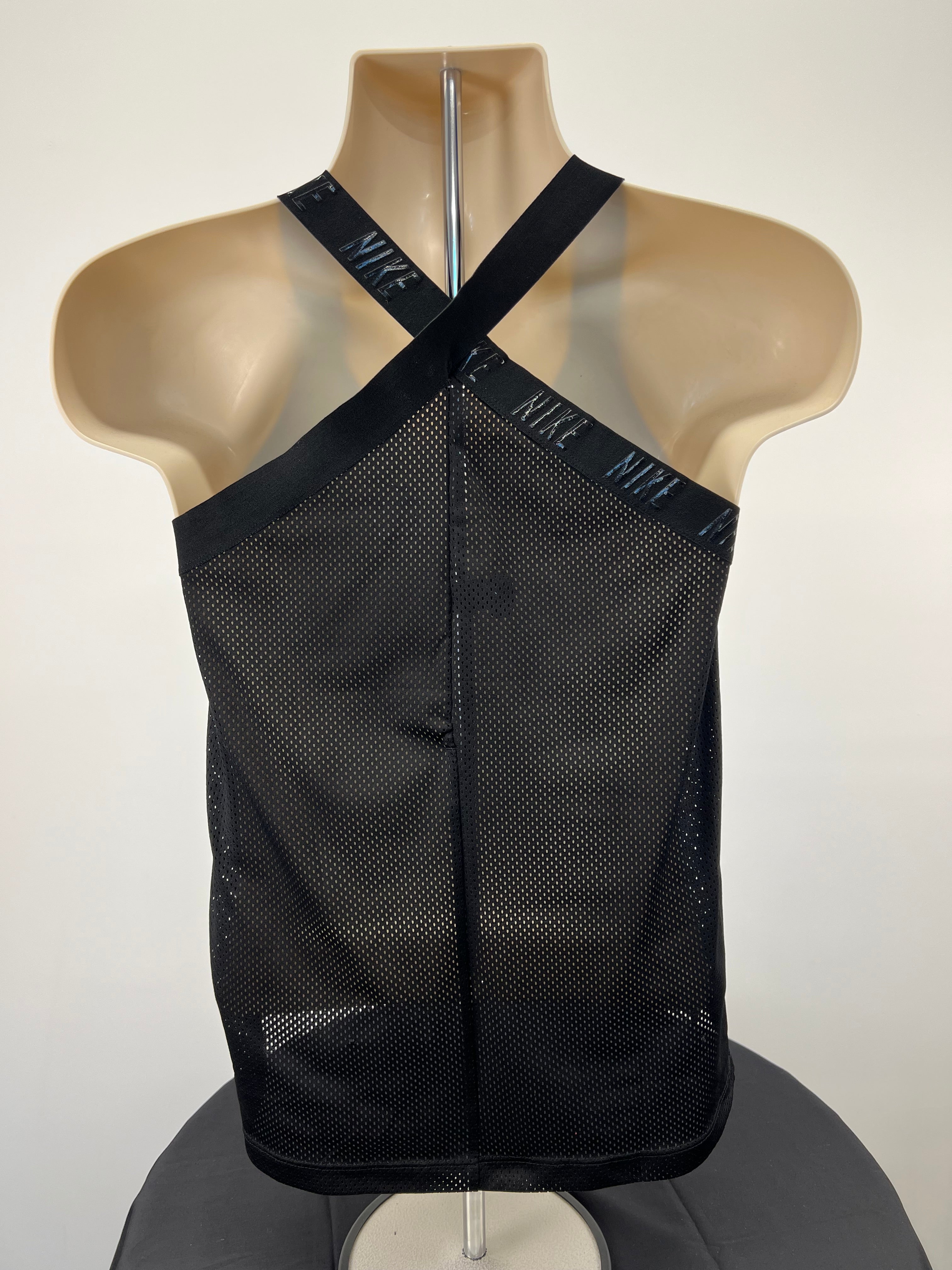 Back view of Nike black mesh vest top with criss-cross straps featuring Nike branding