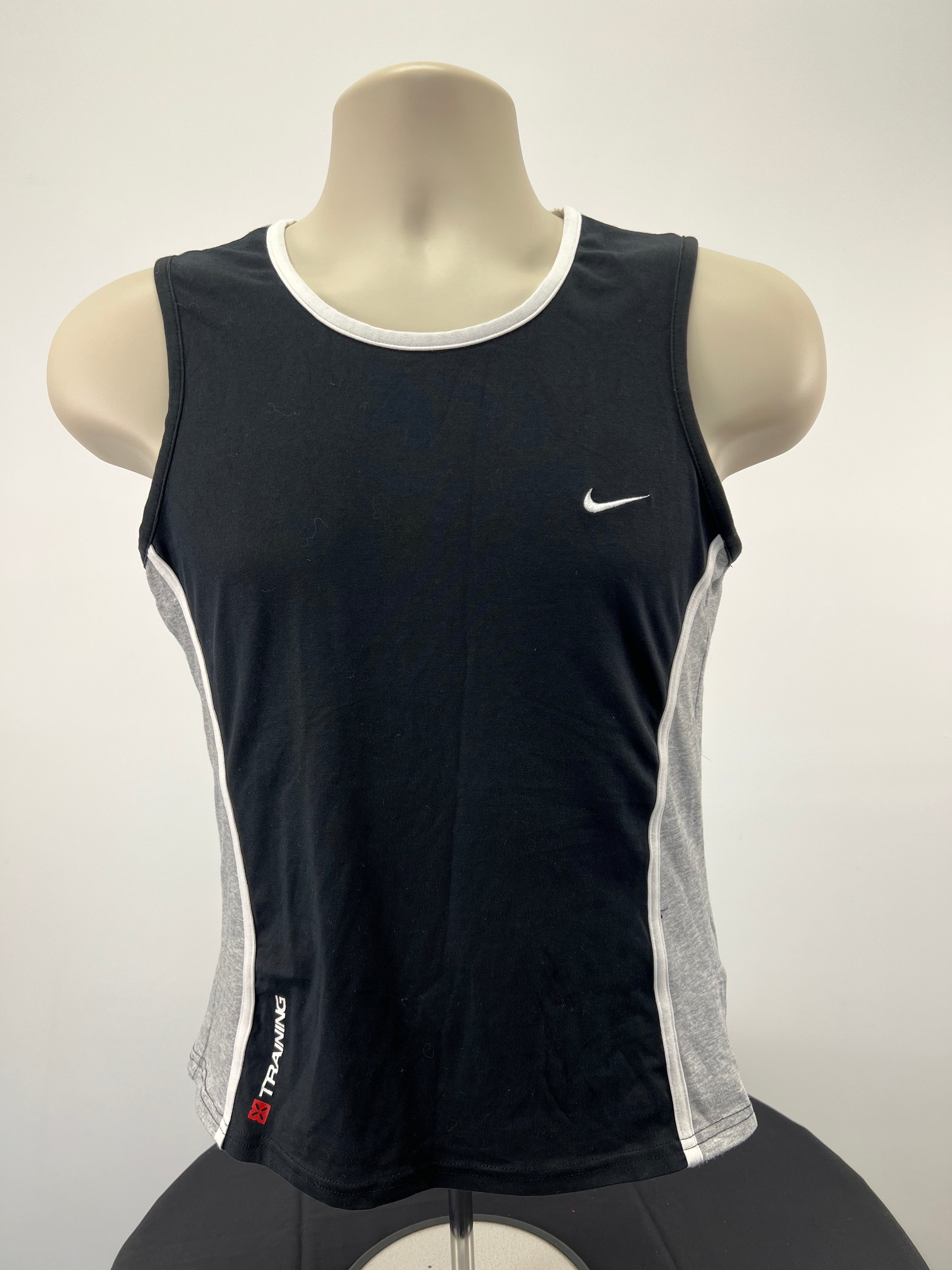 Front view of Nike training vest top in black with grey sides and white trim on mannequin