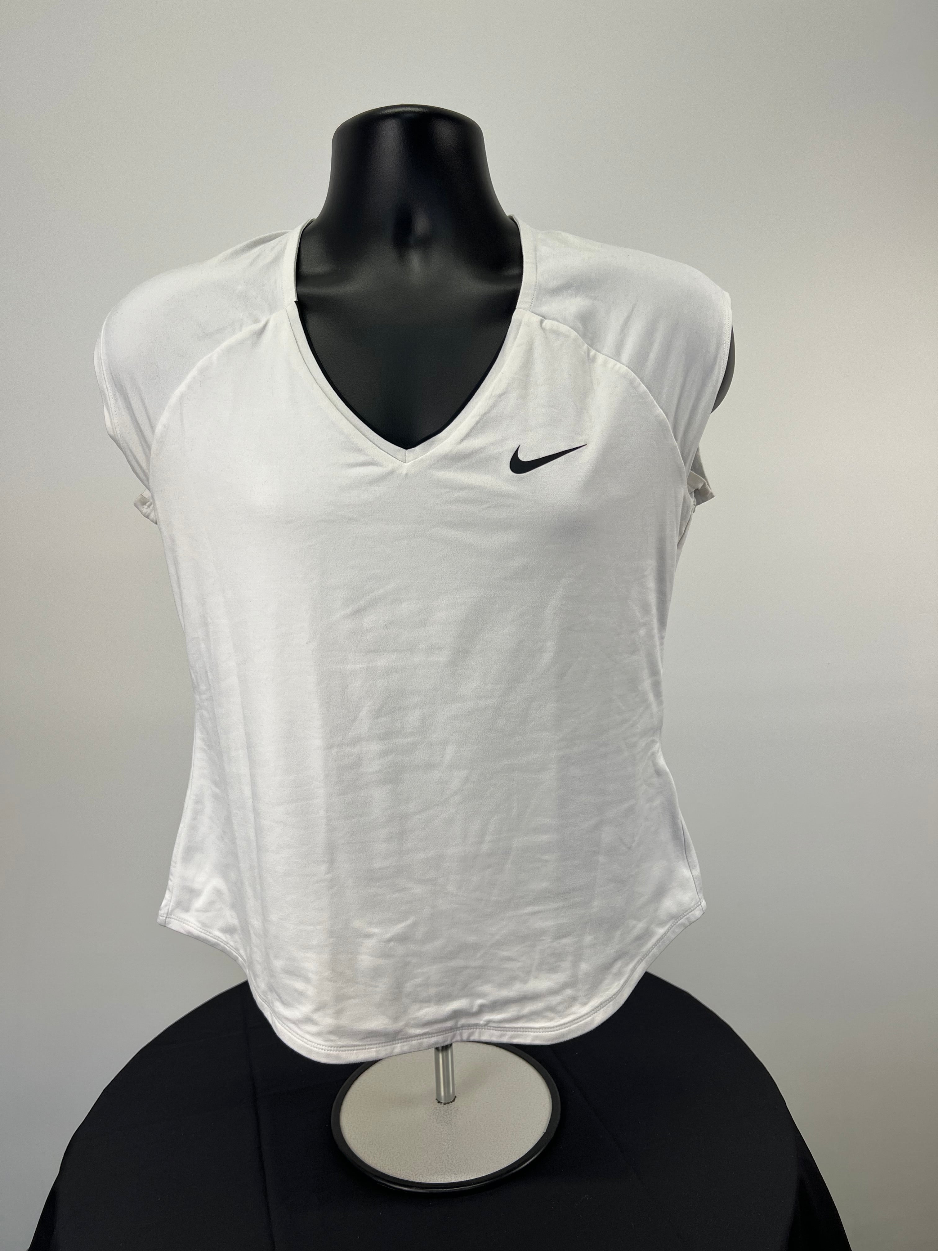 Front view of Nike Dri-Fit white V-neck T-shirt on mannequin