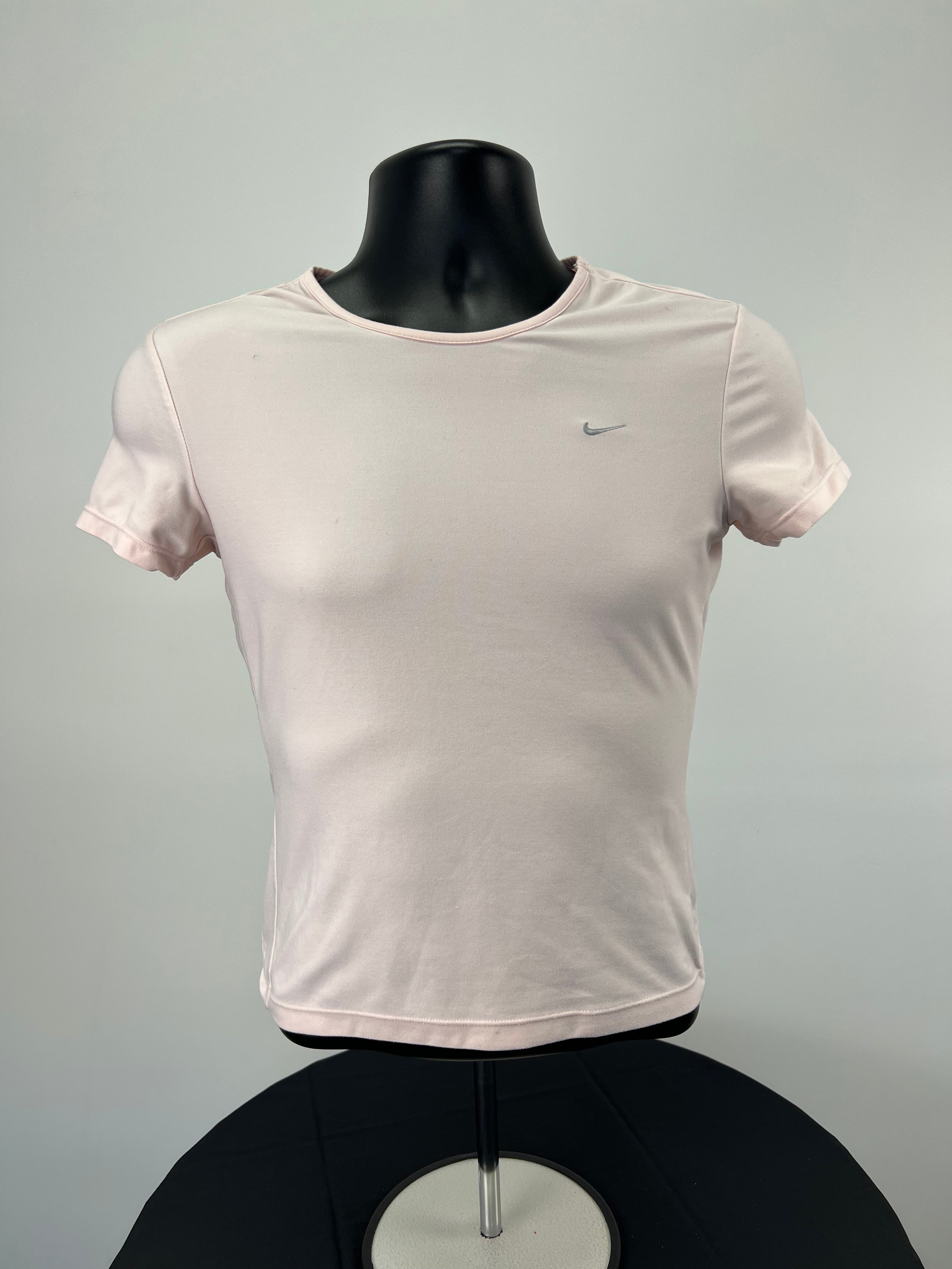 Front view of Nike light pink round neck t-shirt on mannequin