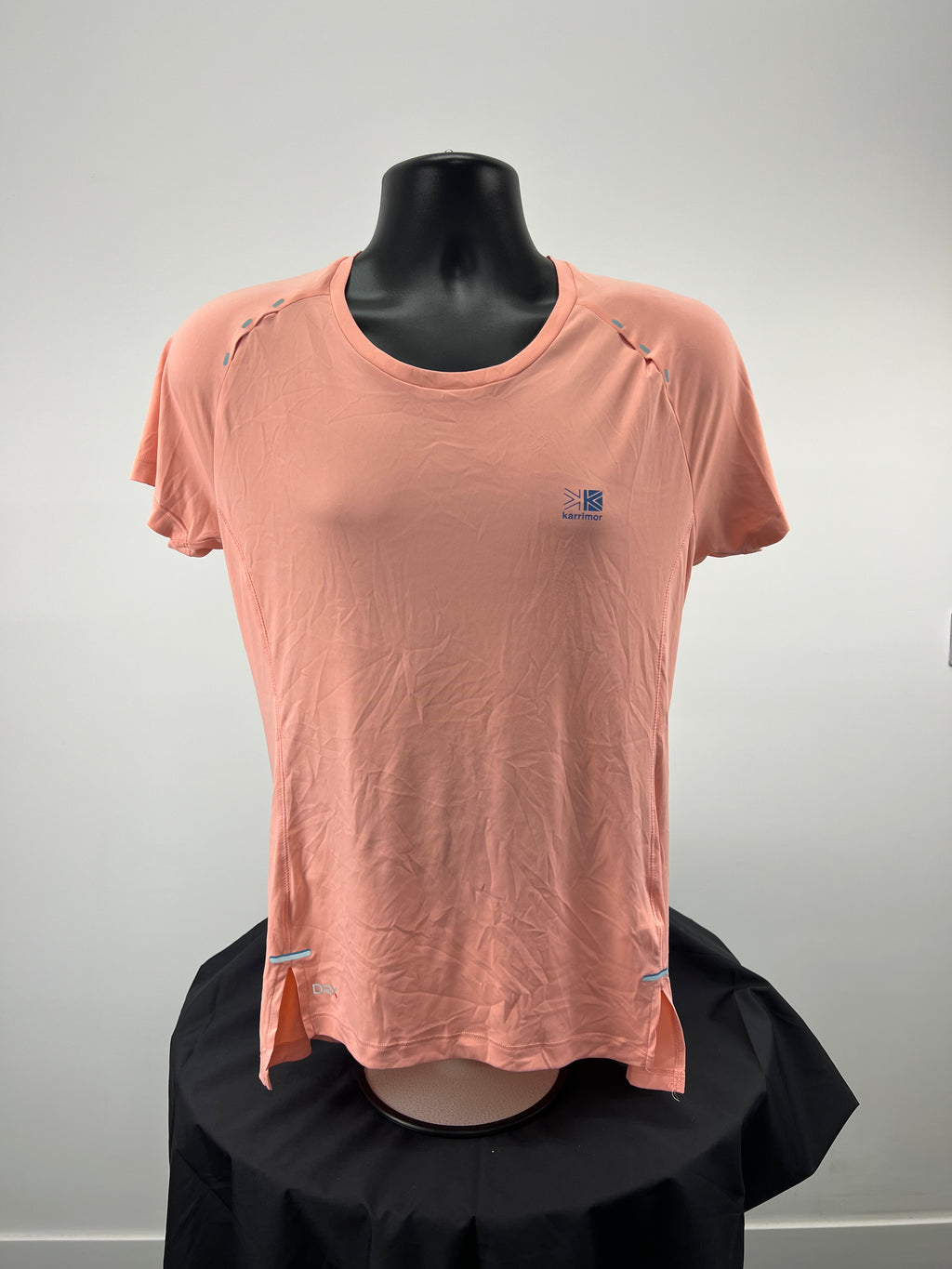 Front view of Karrimor X Lite peach t-shirt on black mannequin