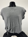 Front view of grey Nike t-shirt with side knot tie at waist on black mannequin