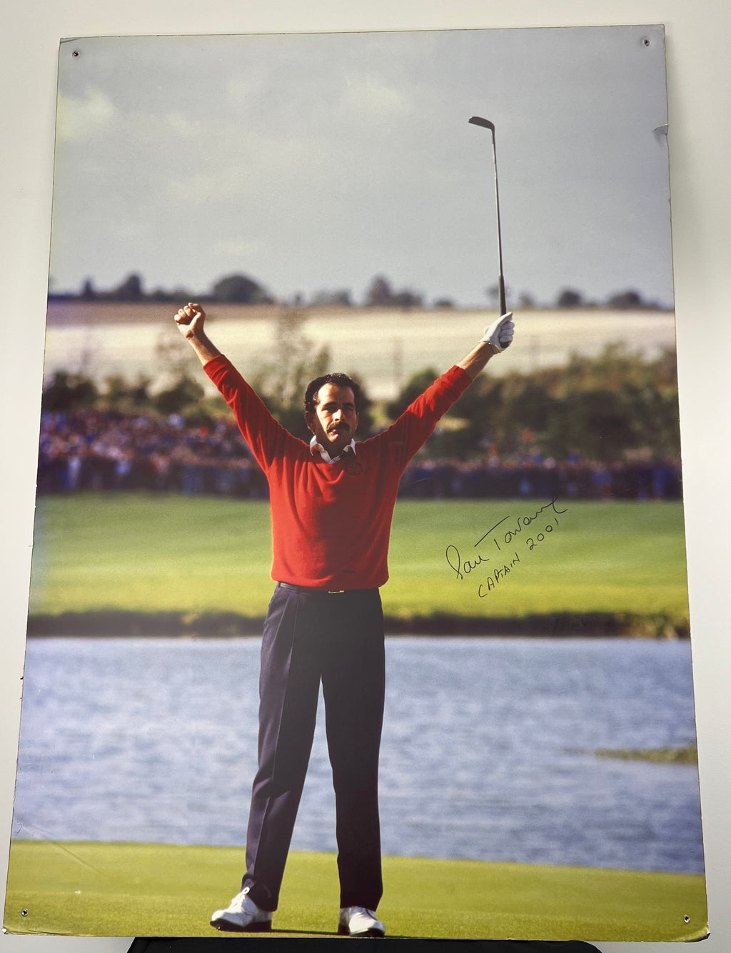 Signed colour print of golfer Sam Torrance celebrating winning putt at 1985 Ryder Cup Belfry wearing red sweater and navy trousers