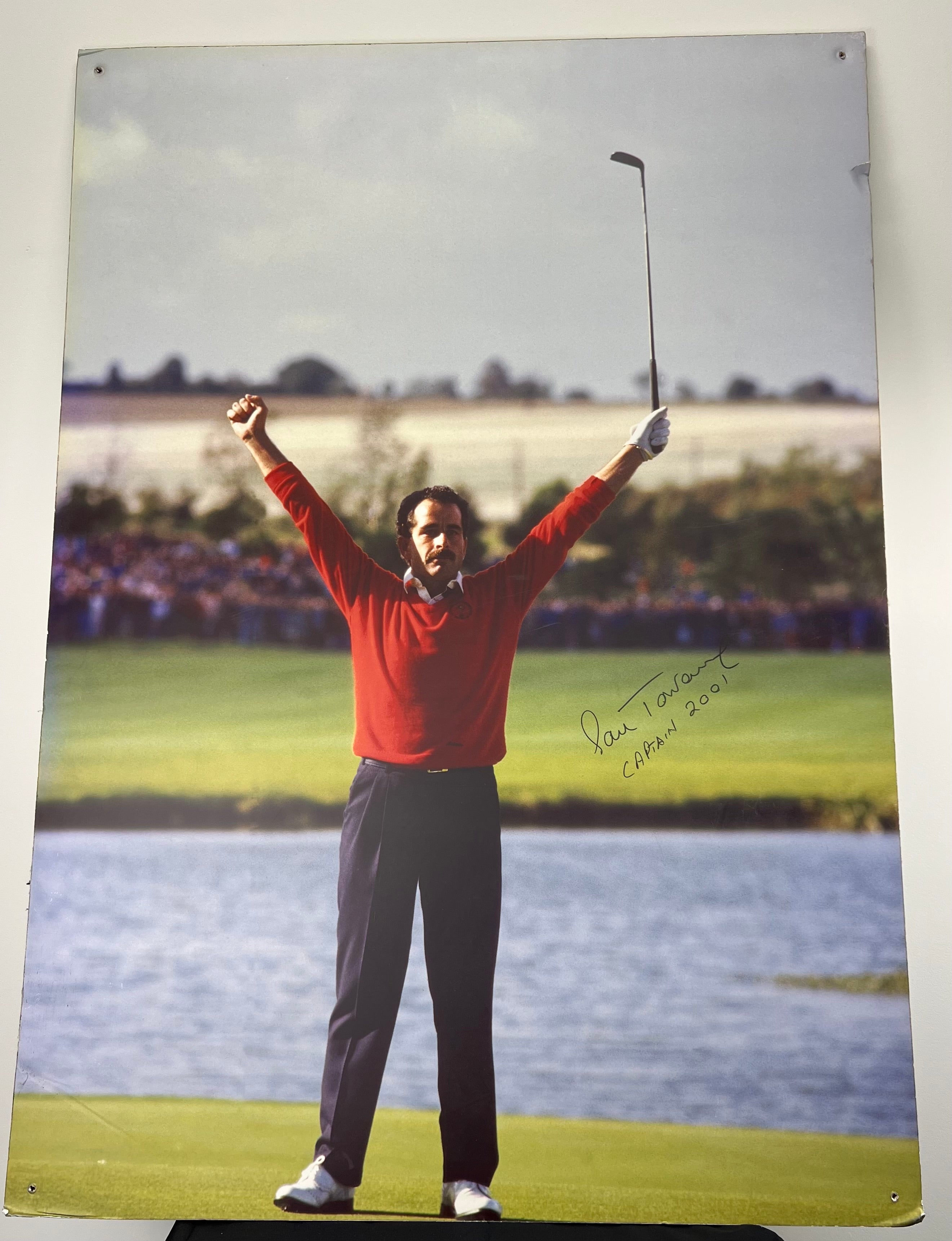 Signed colour print of golfer Sam Torrance celebrating winning putt at 1985 Ryder Cup Belfry wearing red sweater and navy trousers