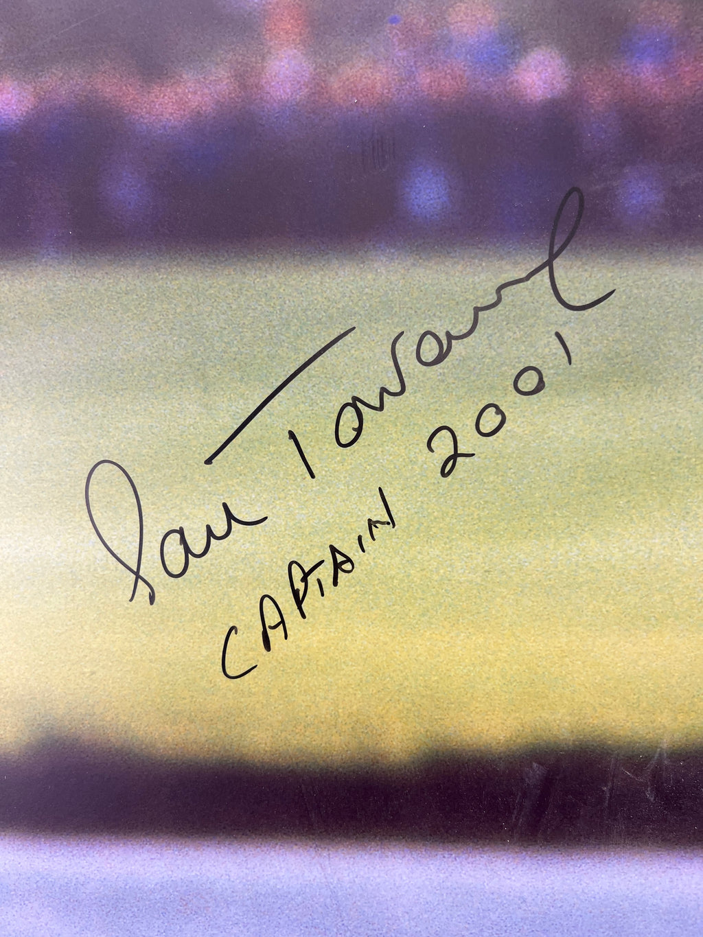 Close-up of Sam Torrance's signature with 'Captain 2001' inscription on the print