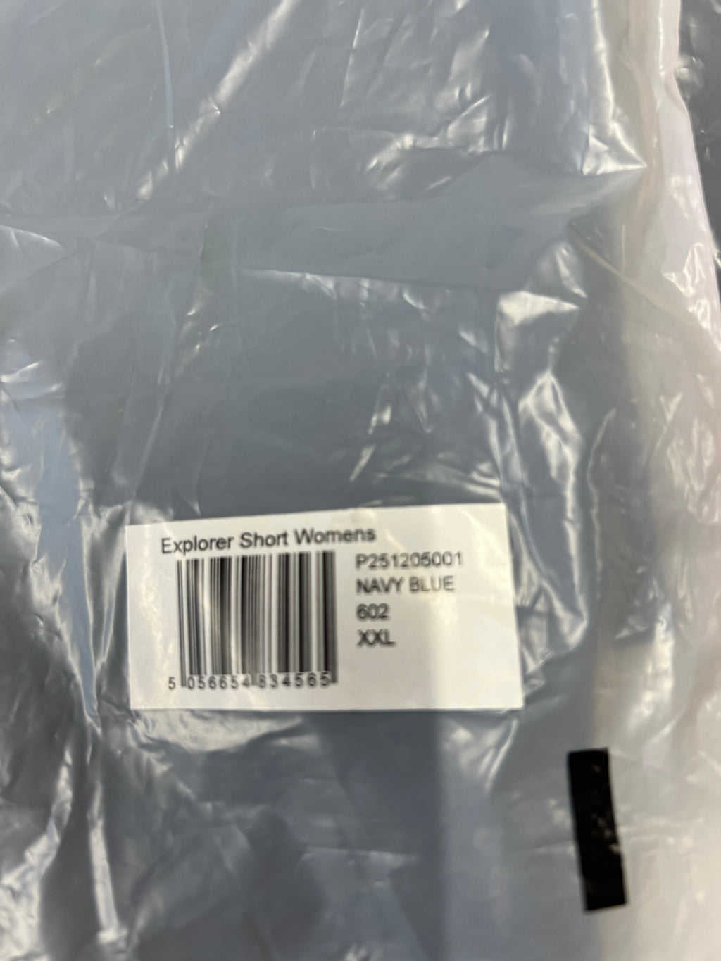 Packaging label showing size XXL and navy blue colour for women's explorer shorts