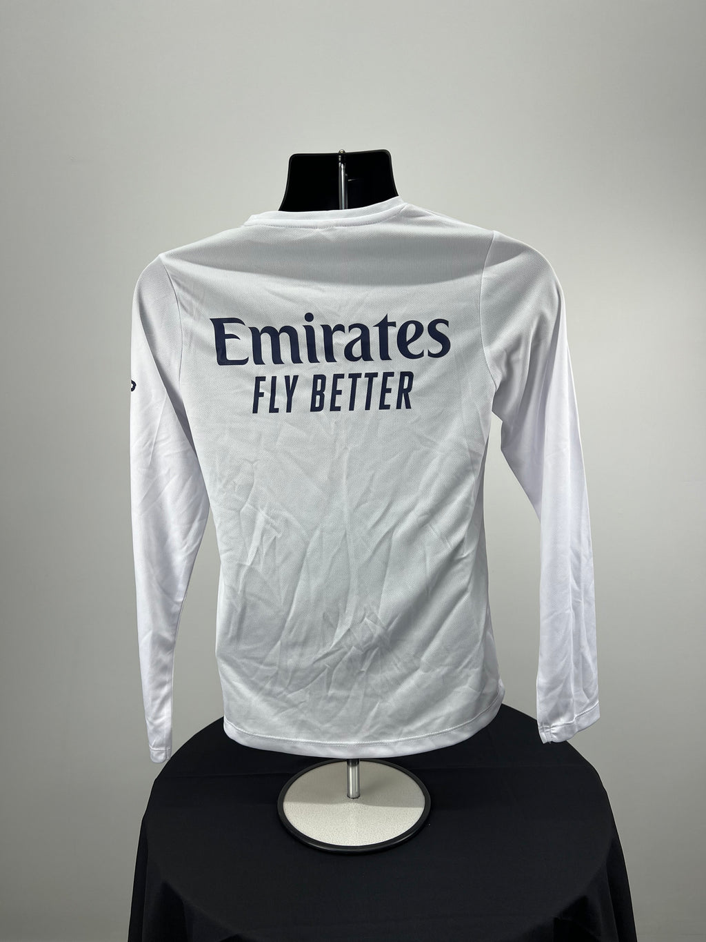Rear view of Women’s Emirates Team GBR x Henri Lloyd 2025 white long sleeve tee showing Emirates Fly Better logo