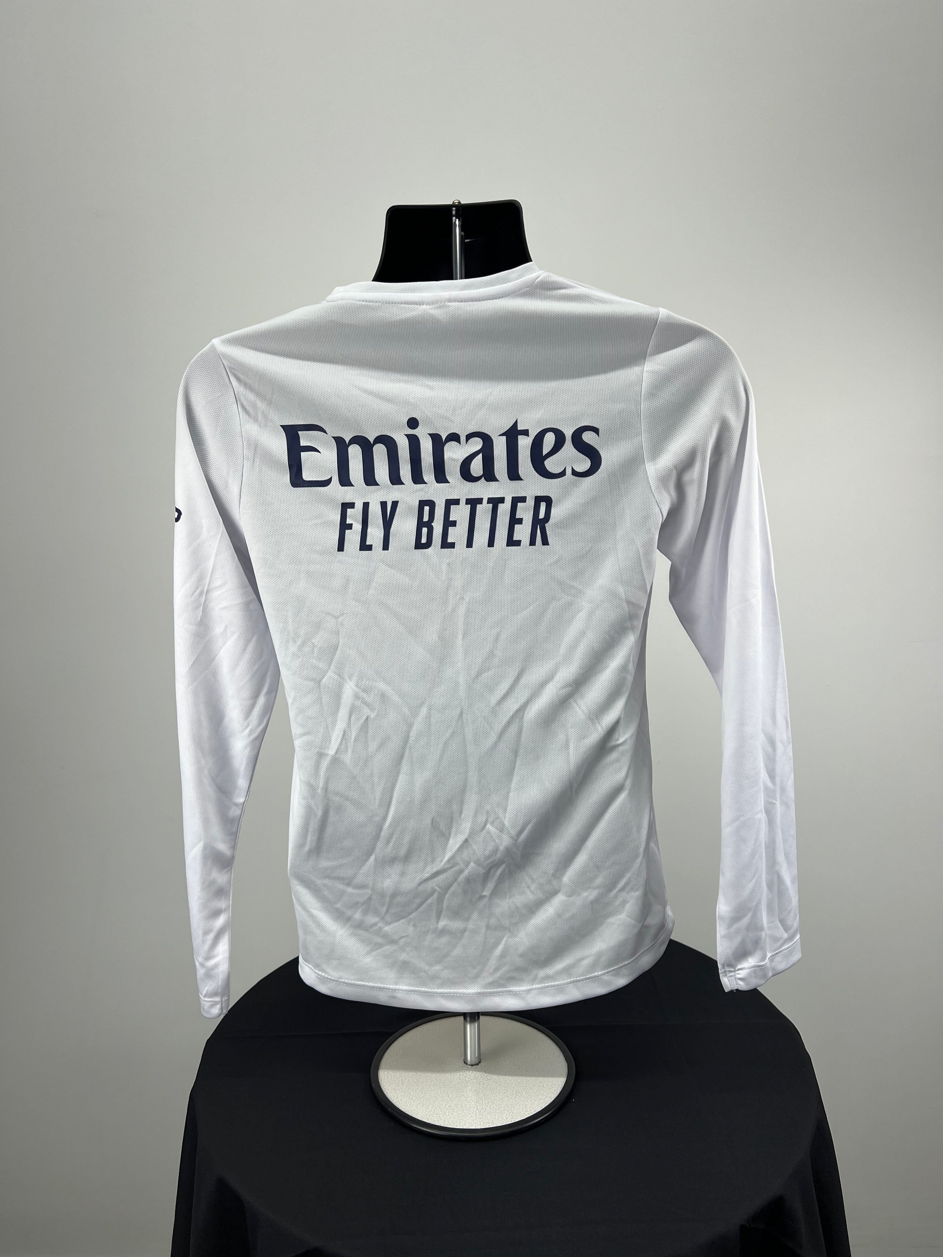 Rear view of Women’s Emirates Team GBR x Henri Lloyd 2025 white long sleeve tee showing Emirates Fly Better logo