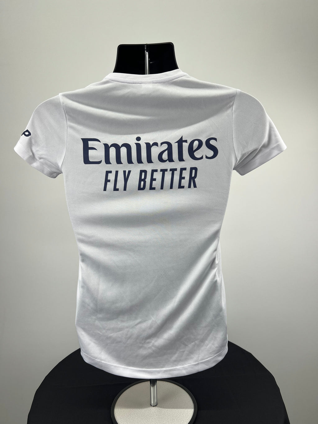 Back view of Women's Emirates Team GBR x Henri Lloyd white short sleeve top with Emirates branding
