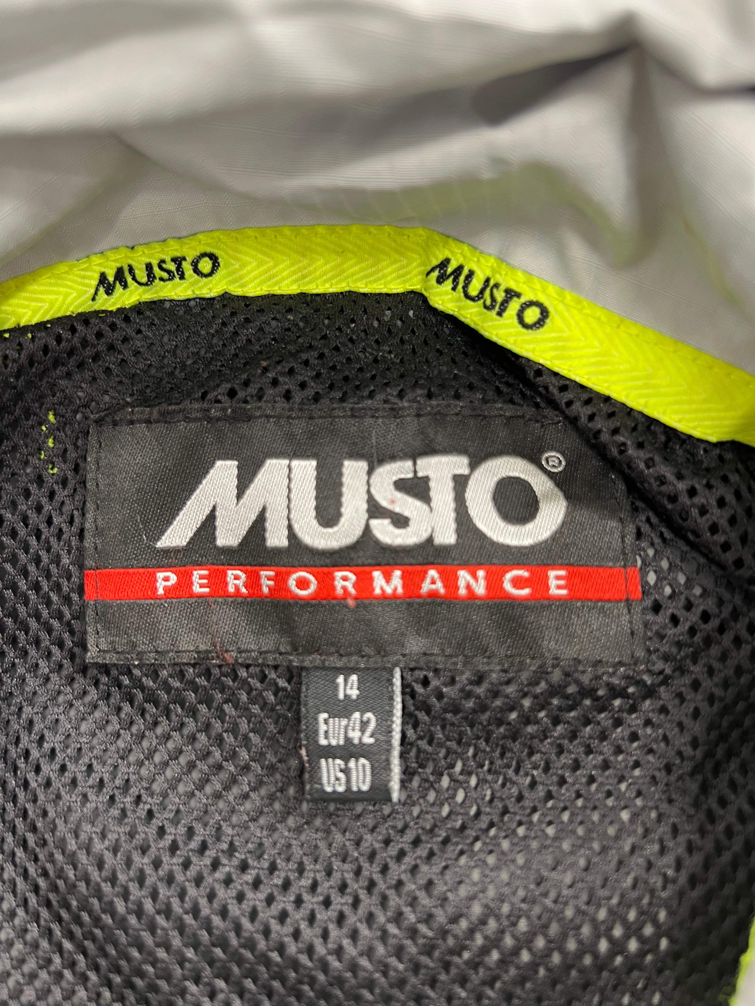 Close-up of internal Musto Performance label with size 14 EUR 42 US 10 inside the jacket