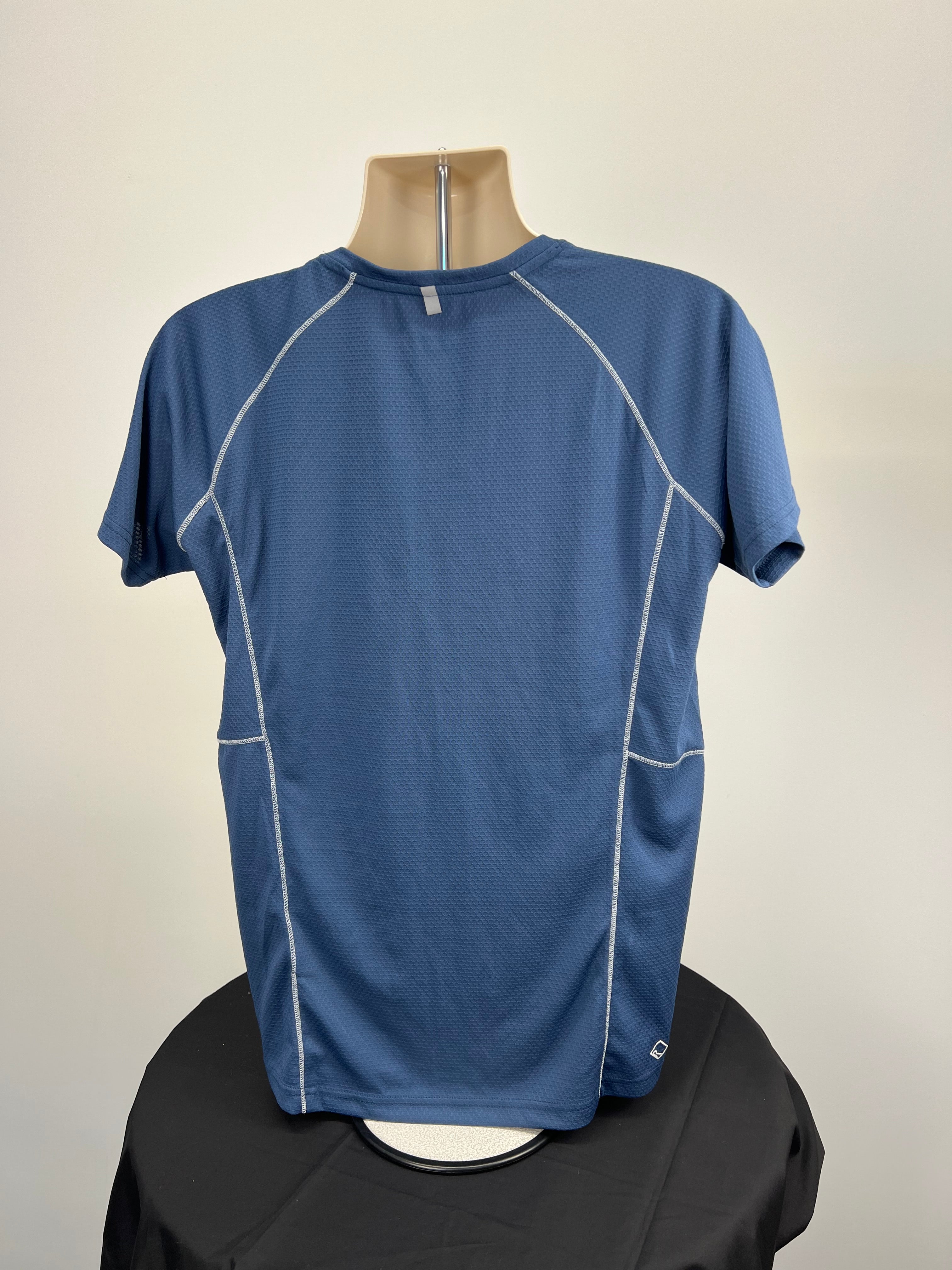 Back view of women's blue Regatta V-neck t-shirt on mannequin highlighting stitching design