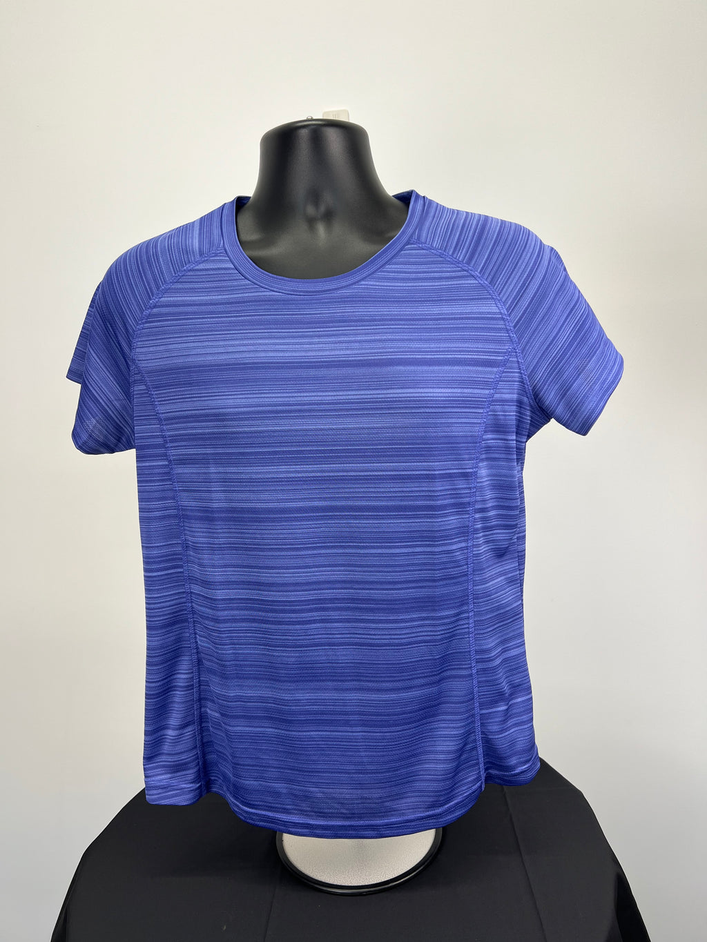 Front view of Mountain Warehouse Isocool blue quick drying t-shirt on mannequin
