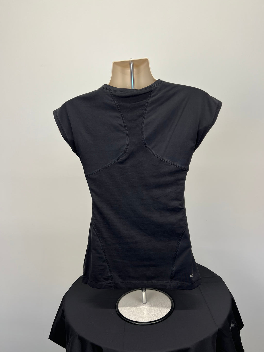 Back view of Adidas black tunic length t-shirt showing stitched panel design